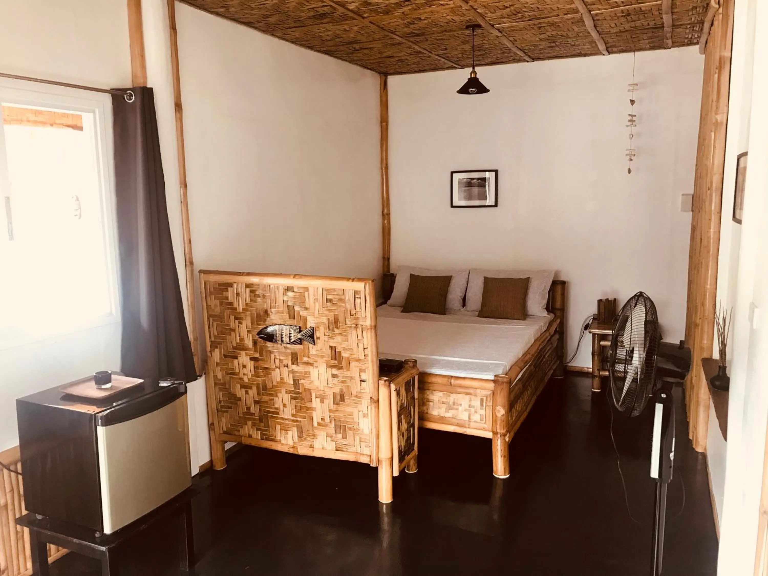 Photo of the whole room, Bed in Everyday Sunday Formerly Carl's Island Inn