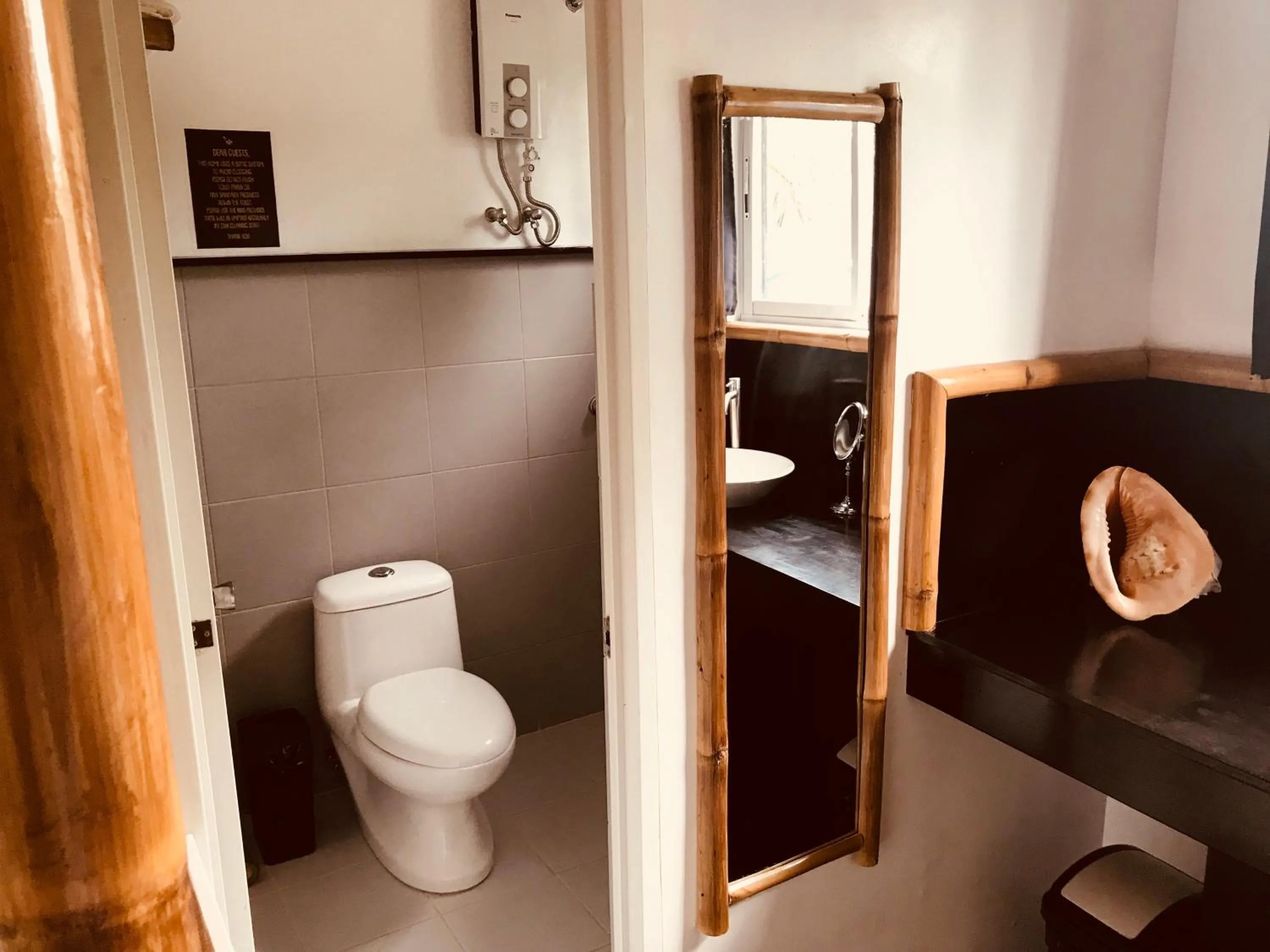 Shower in Everyday Sunday Formerly Carl's Island Inn