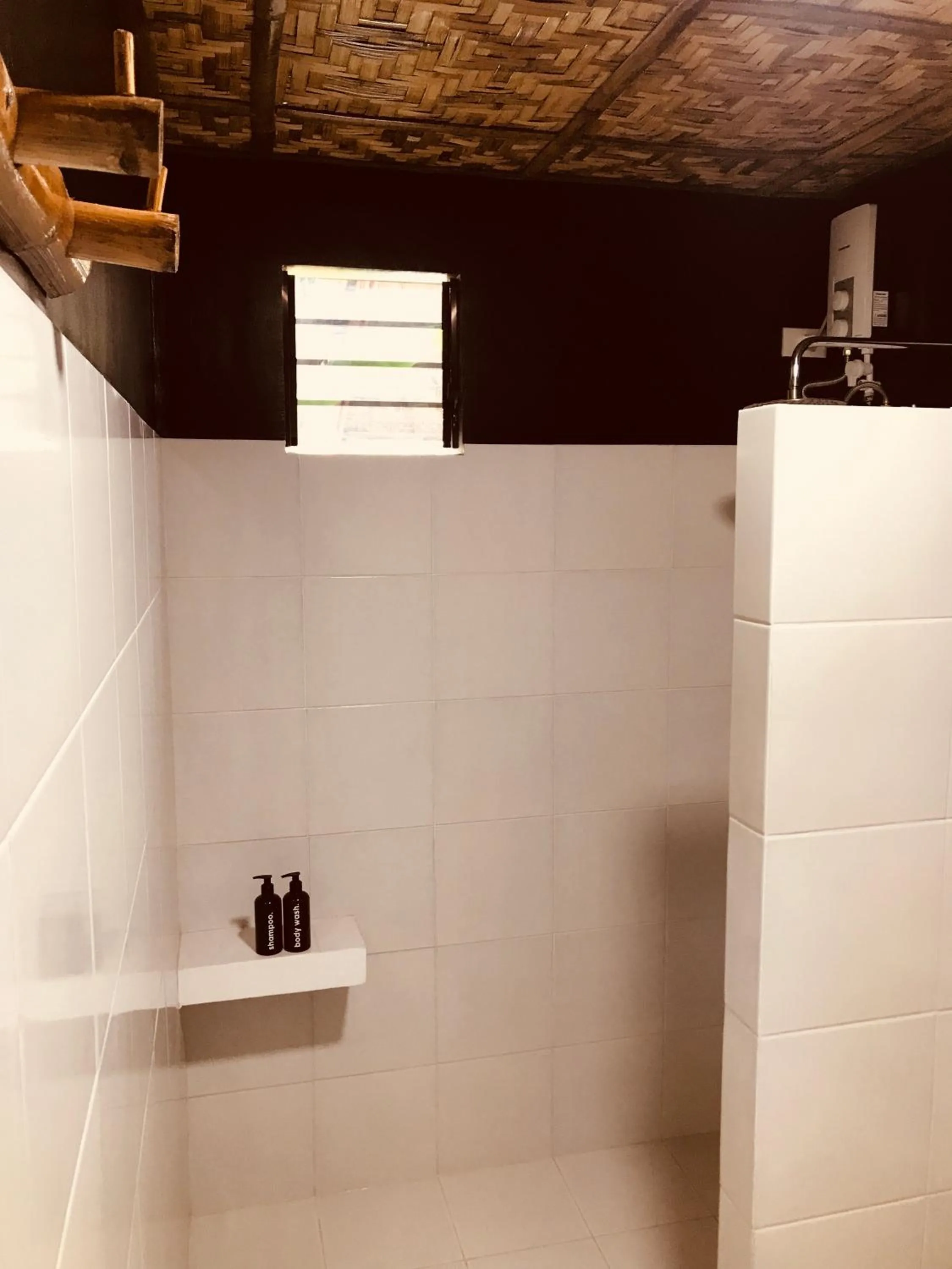 Shower in Everyday Sunday Formerly Carl's Island Inn