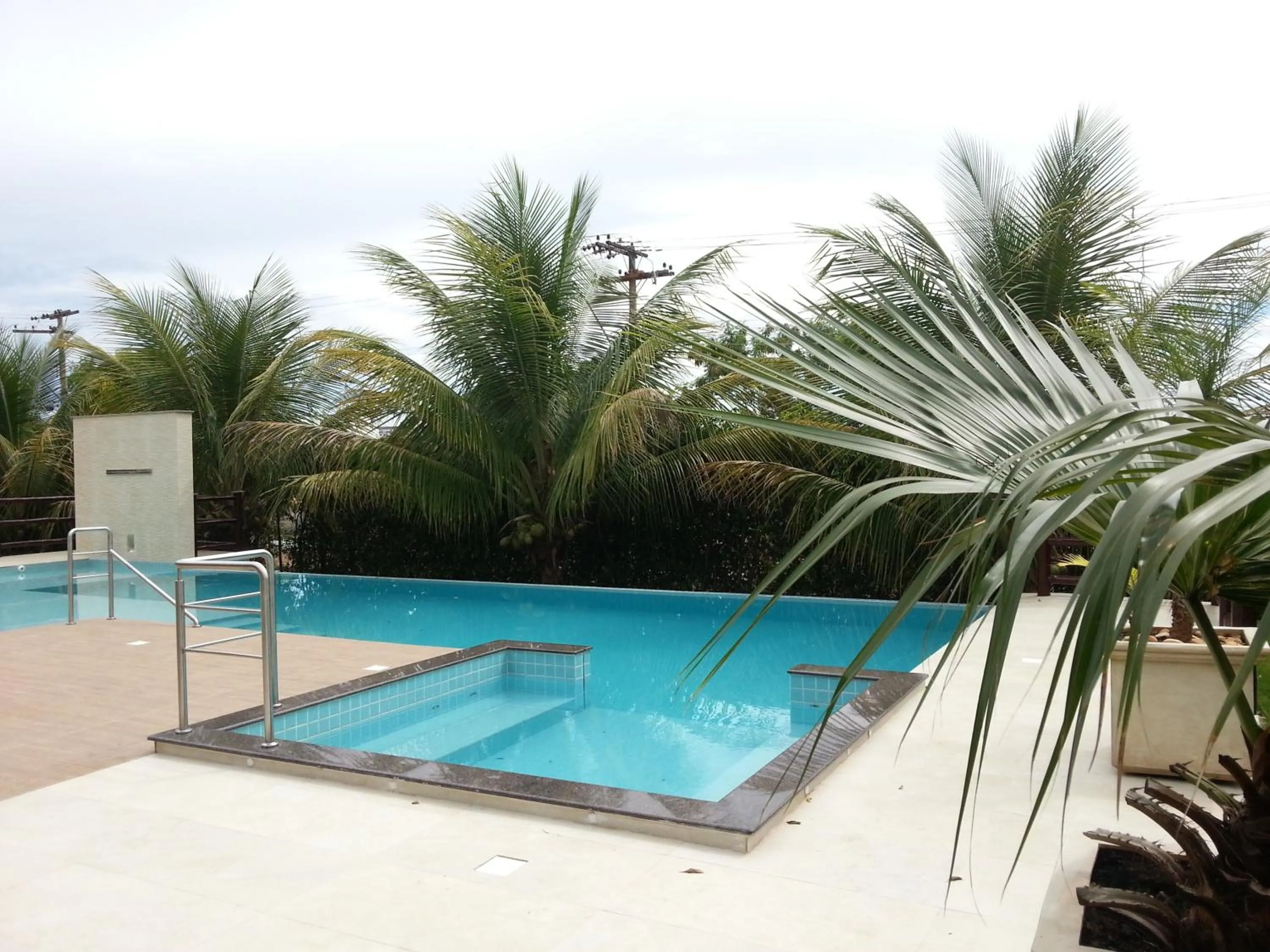 Swimming pool in Hotel das Palmeiras