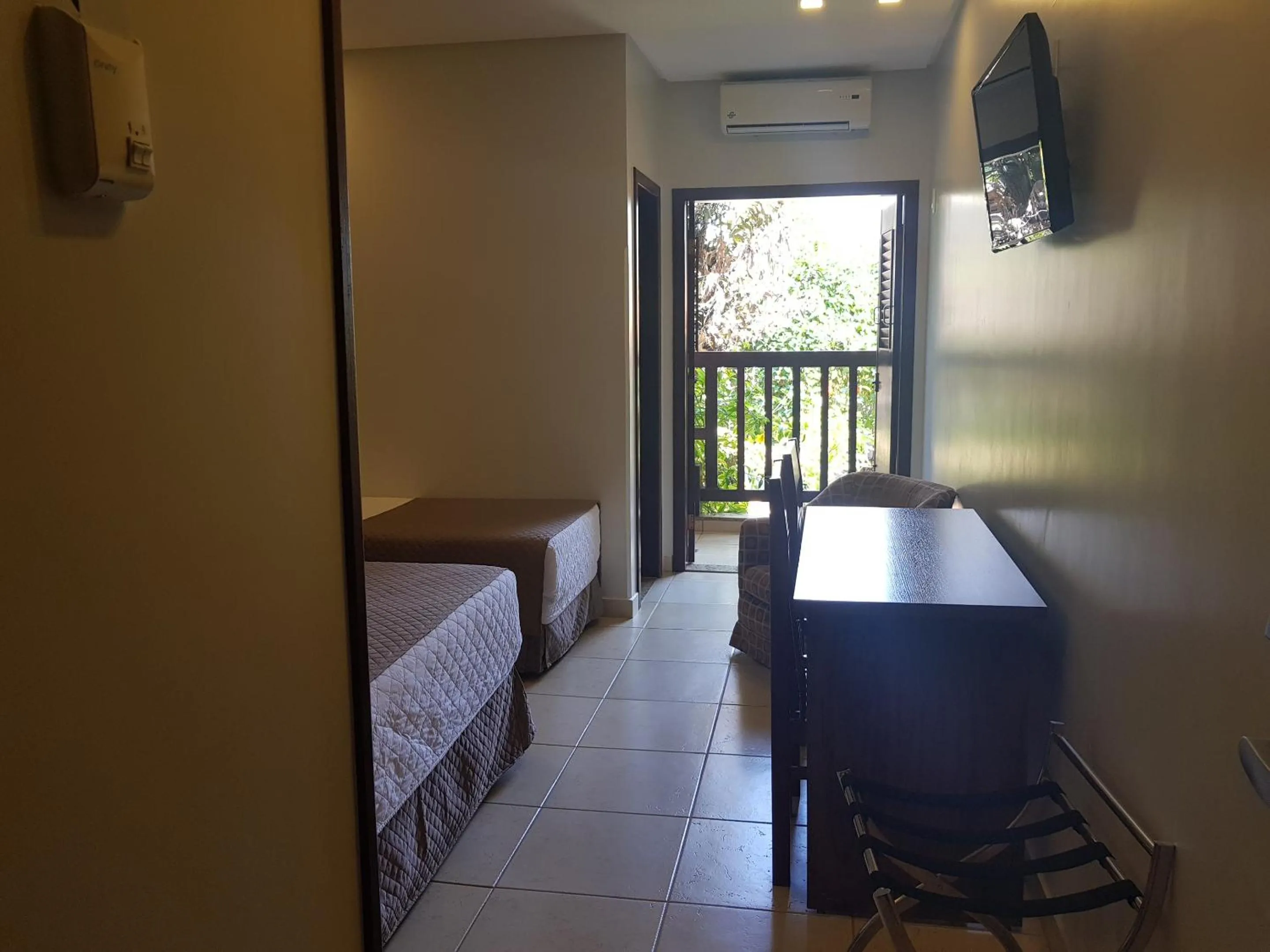 Bed in Hotel das Palmeiras