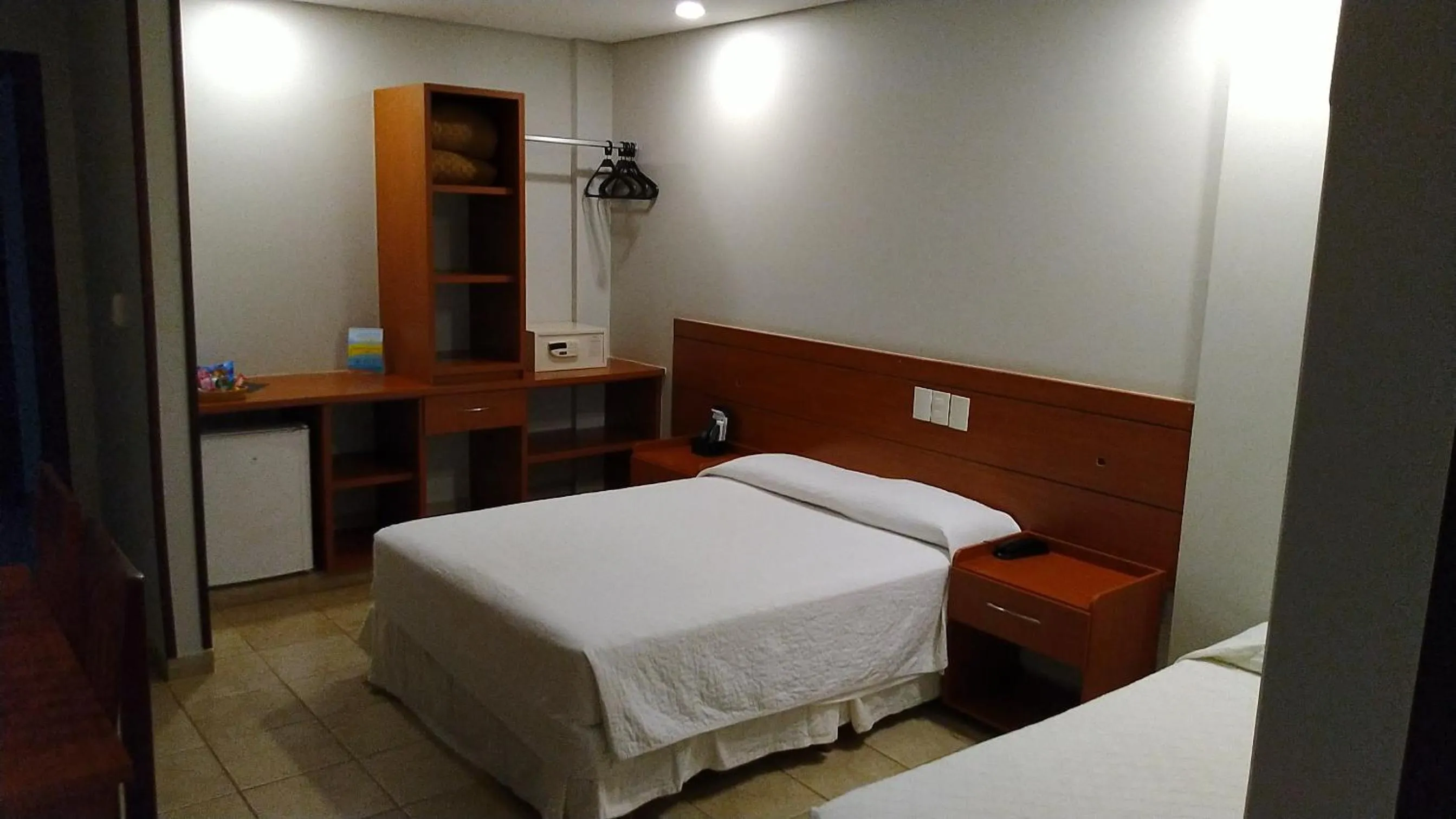 Bed in Hotel das Palmeiras