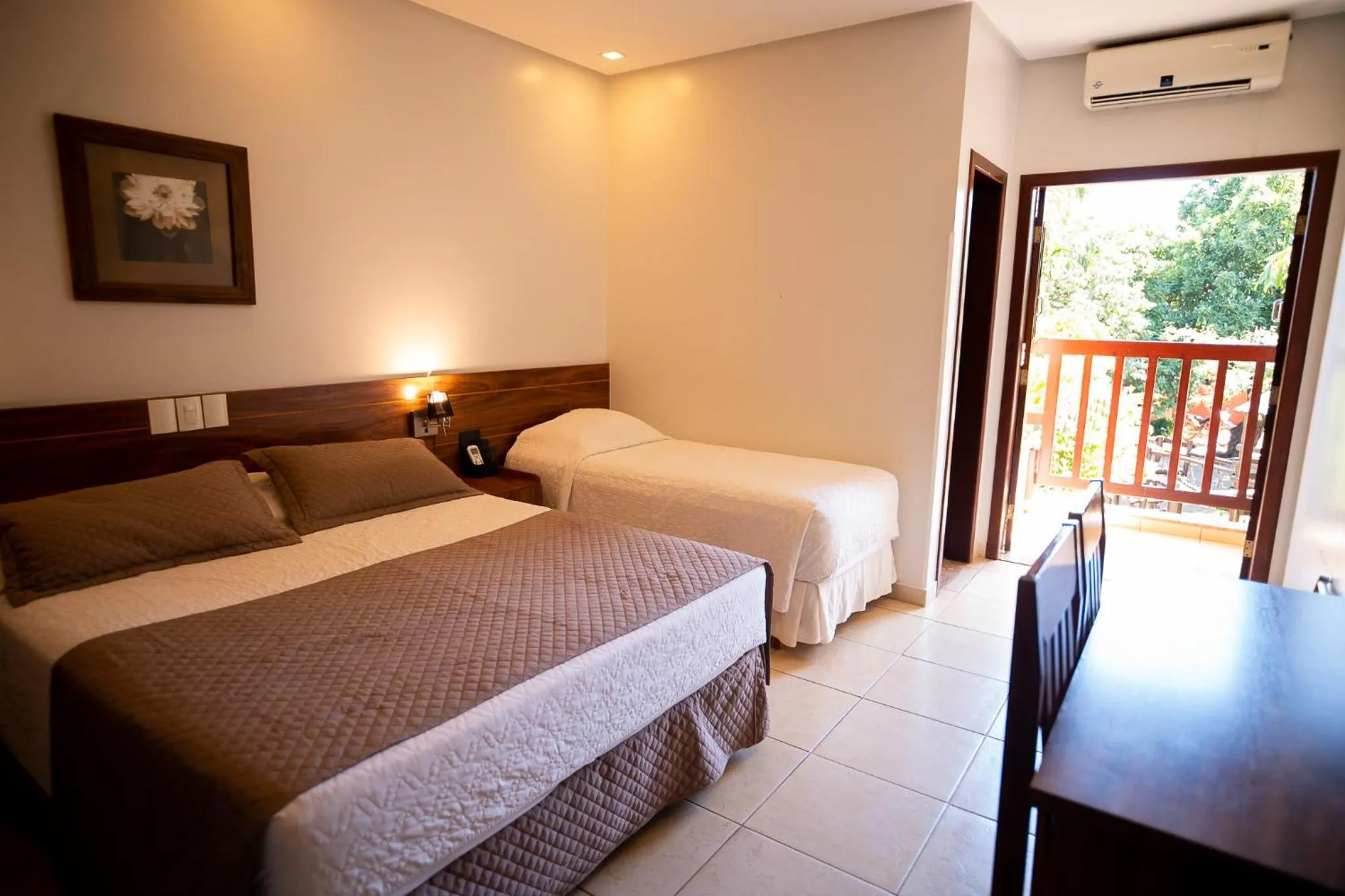 Bed in Hotel das Palmeiras