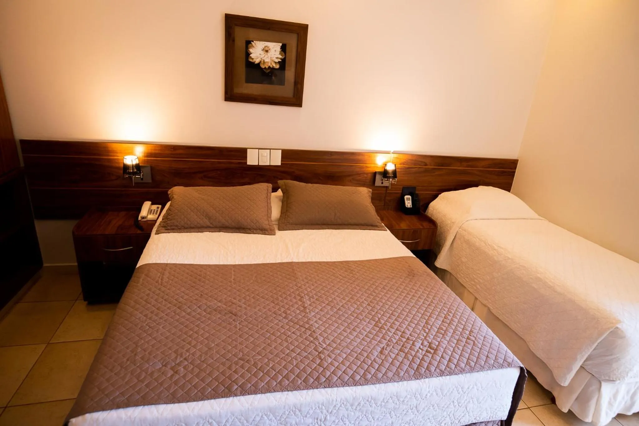 Bed in Hotel das Palmeiras