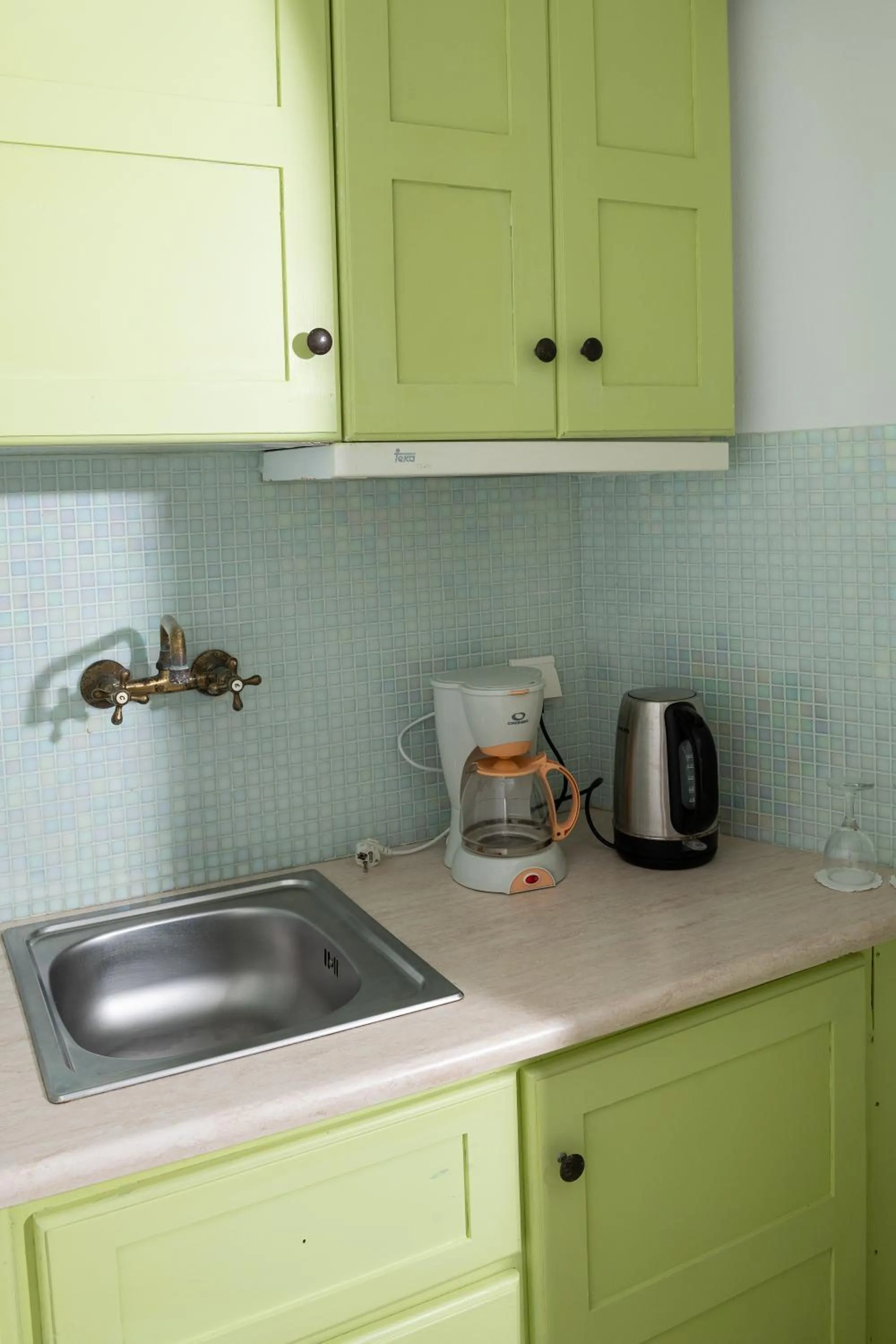 Kitchen or kitchenette in Avant Garde Suites