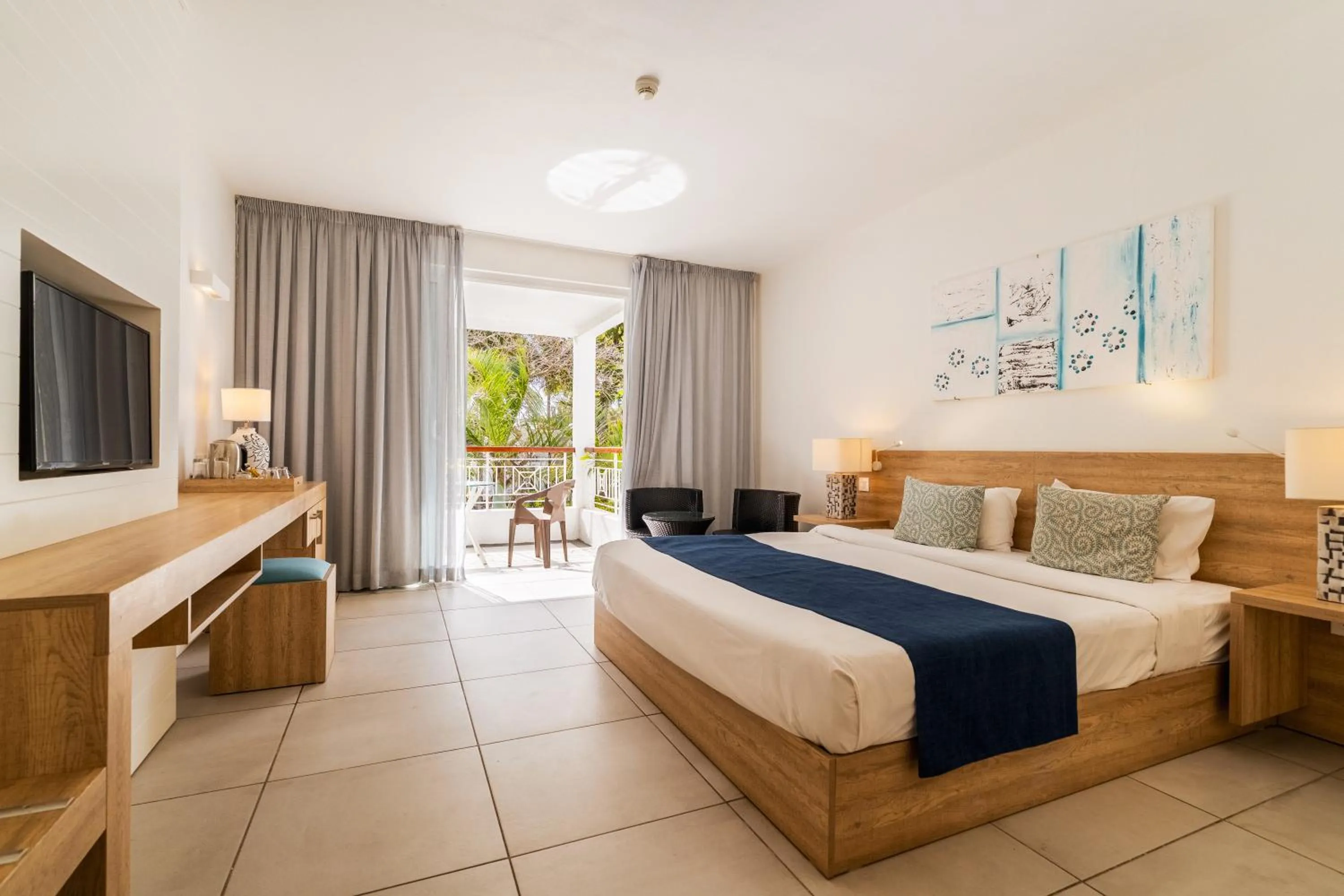 Photo of the whole room, Bed in Casuarina Resort and Spa