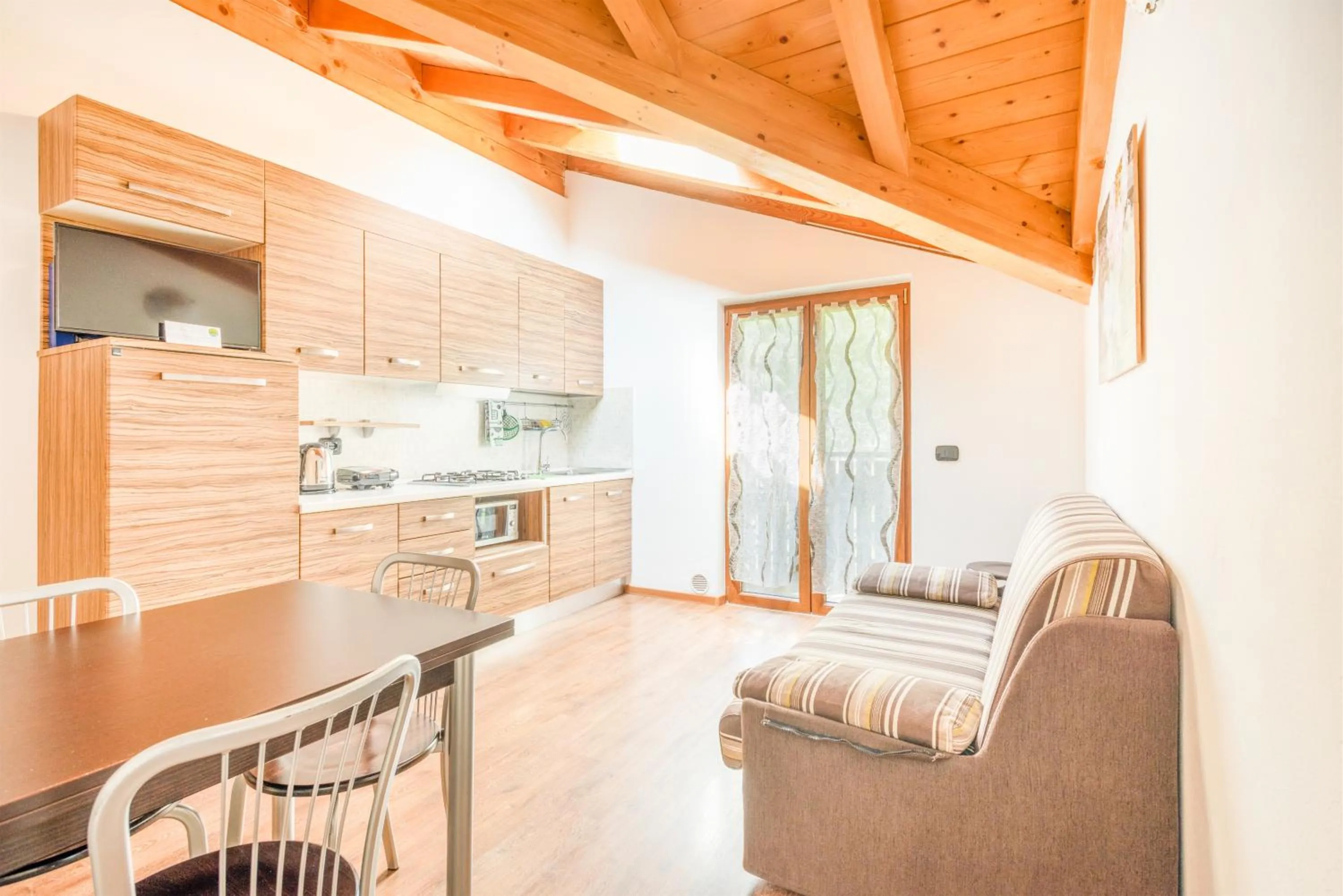 Kitchen or kitchenette in CROSINA HOLIDAY - Residence Toli