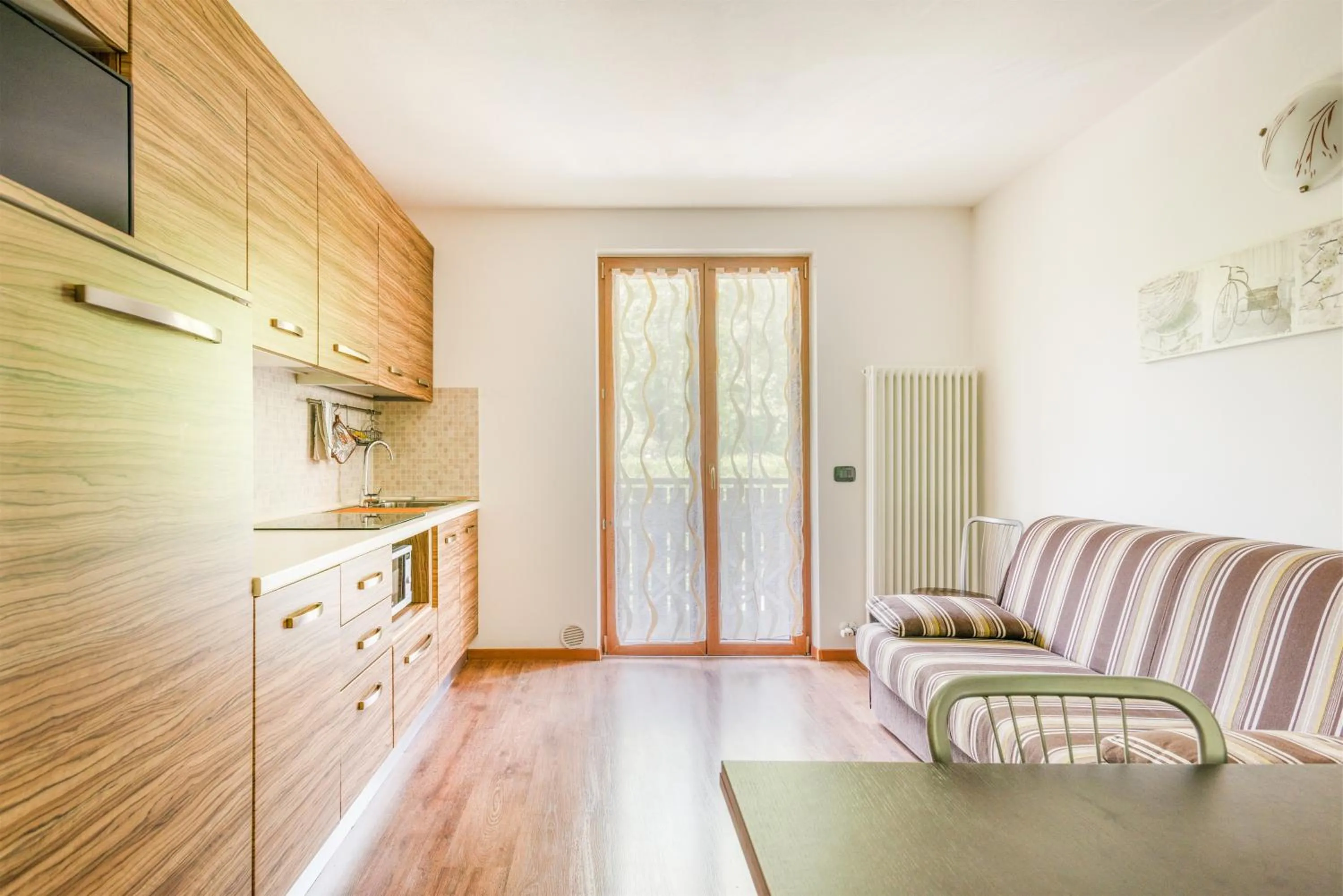 Kitchen or kitchenette in CROSINA HOLIDAY - Residence Toli