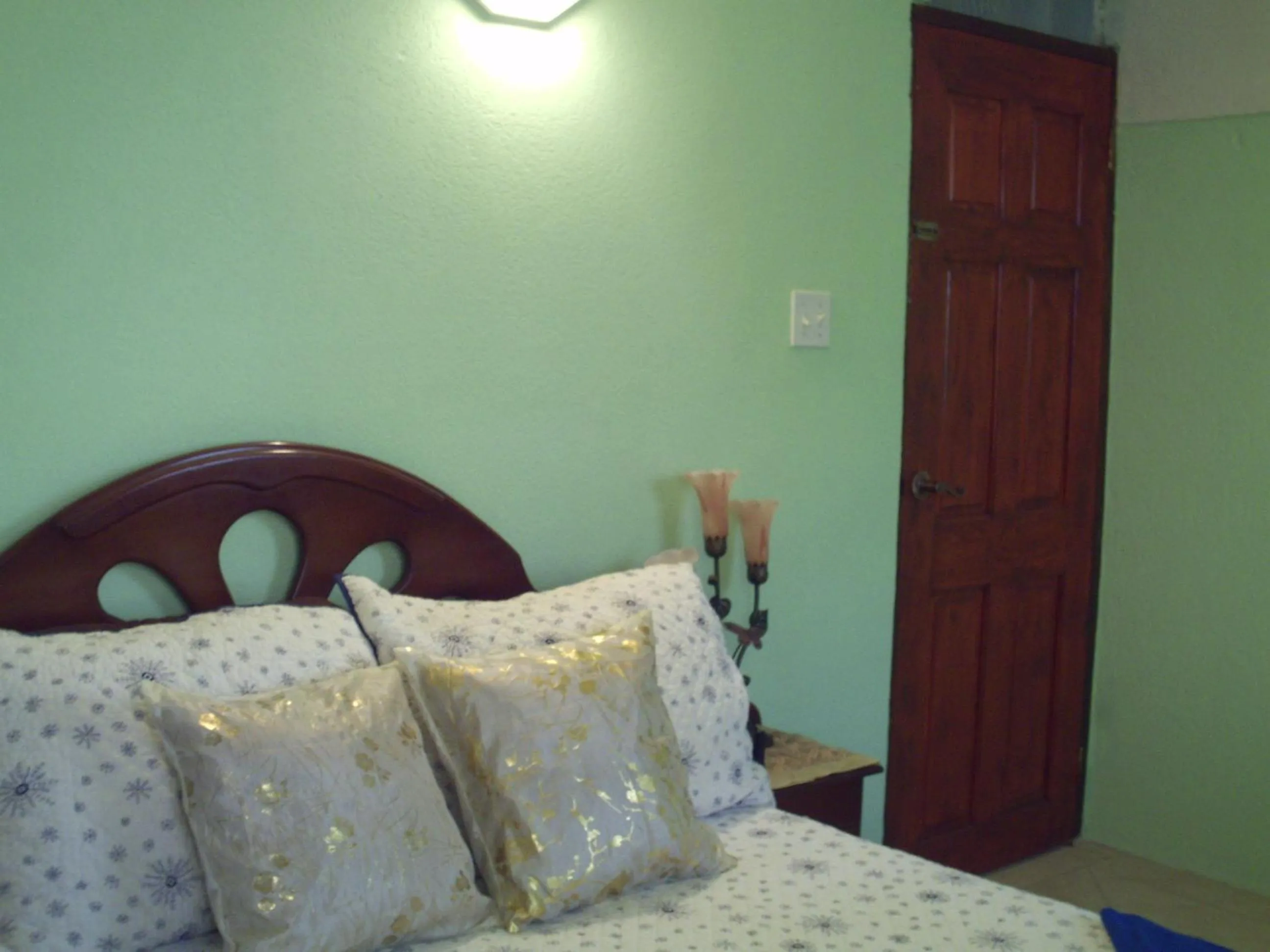 Bed in LeMarida Suites