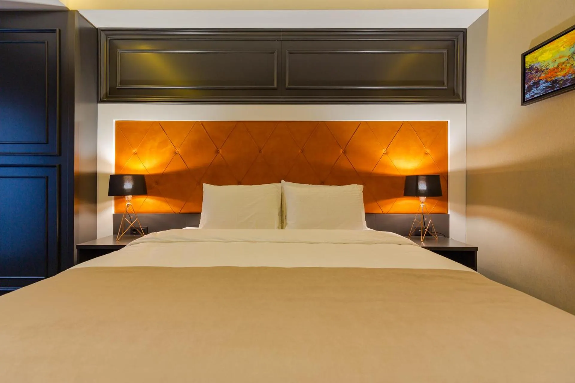 Bed in Tapis Rouge Design Boutique Hotel