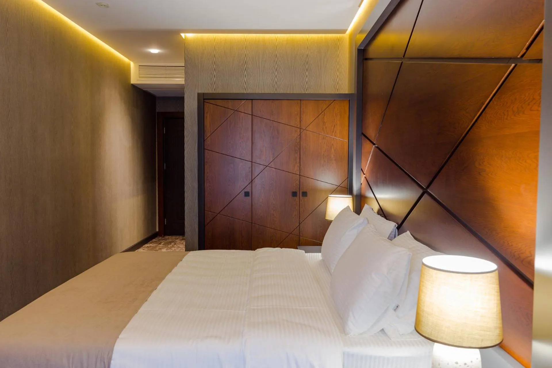 Bed in Tapis Rouge Design Boutique Hotel