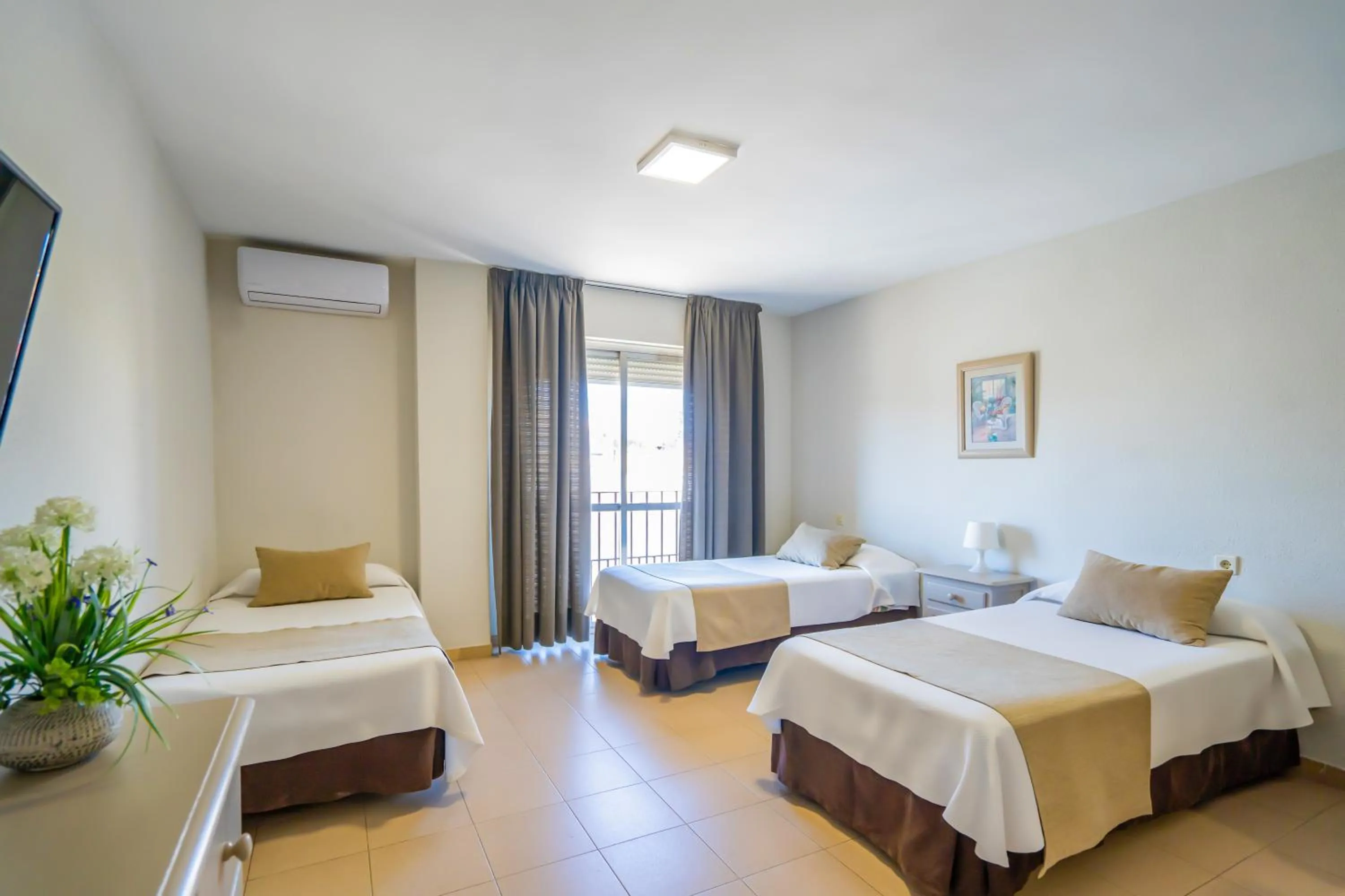 Photo of the whole room, Bed in Apartamentos Puerta del Sur