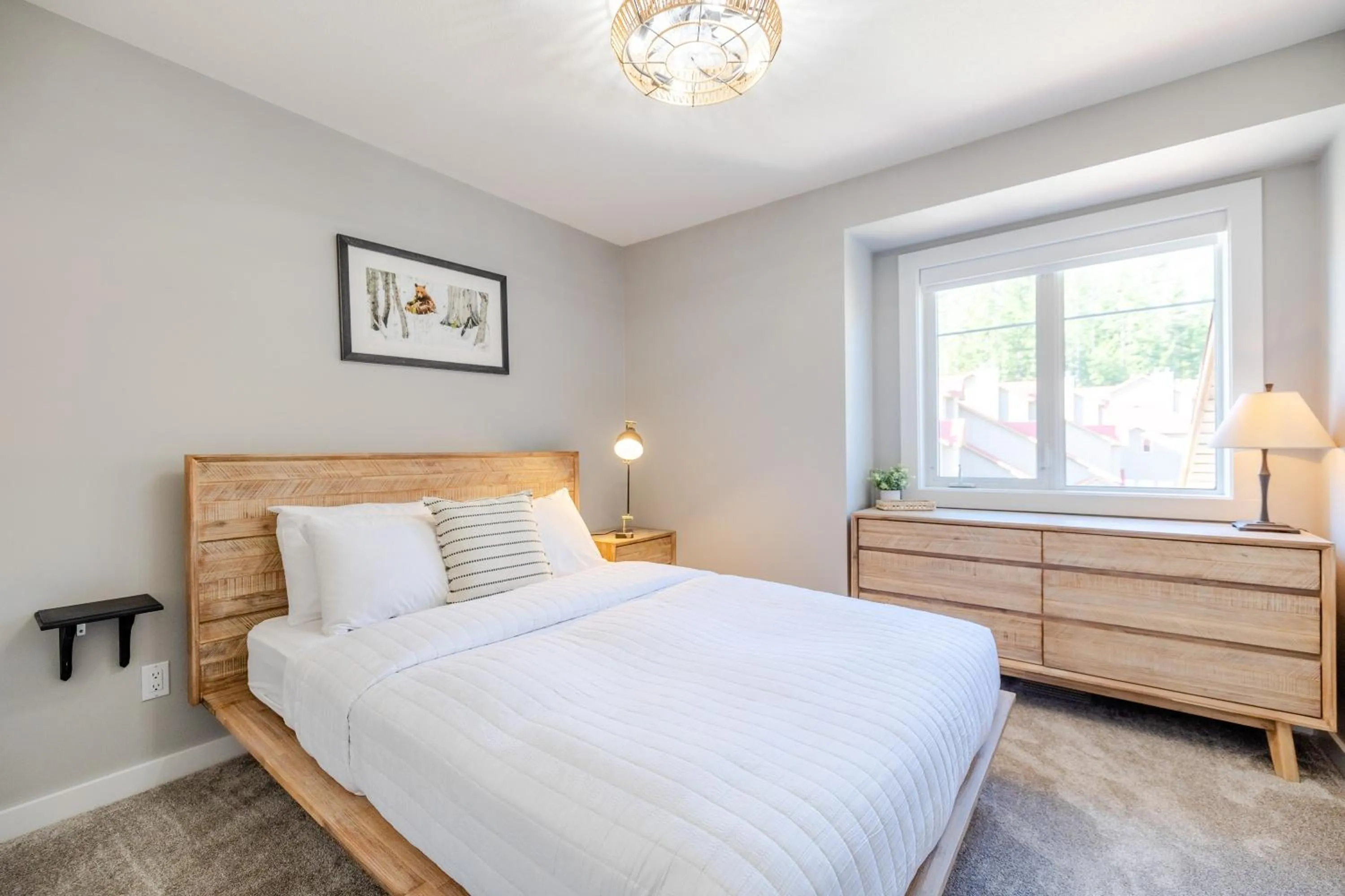 Bed in Stone Creek Chalets by Fernie Central Reservations