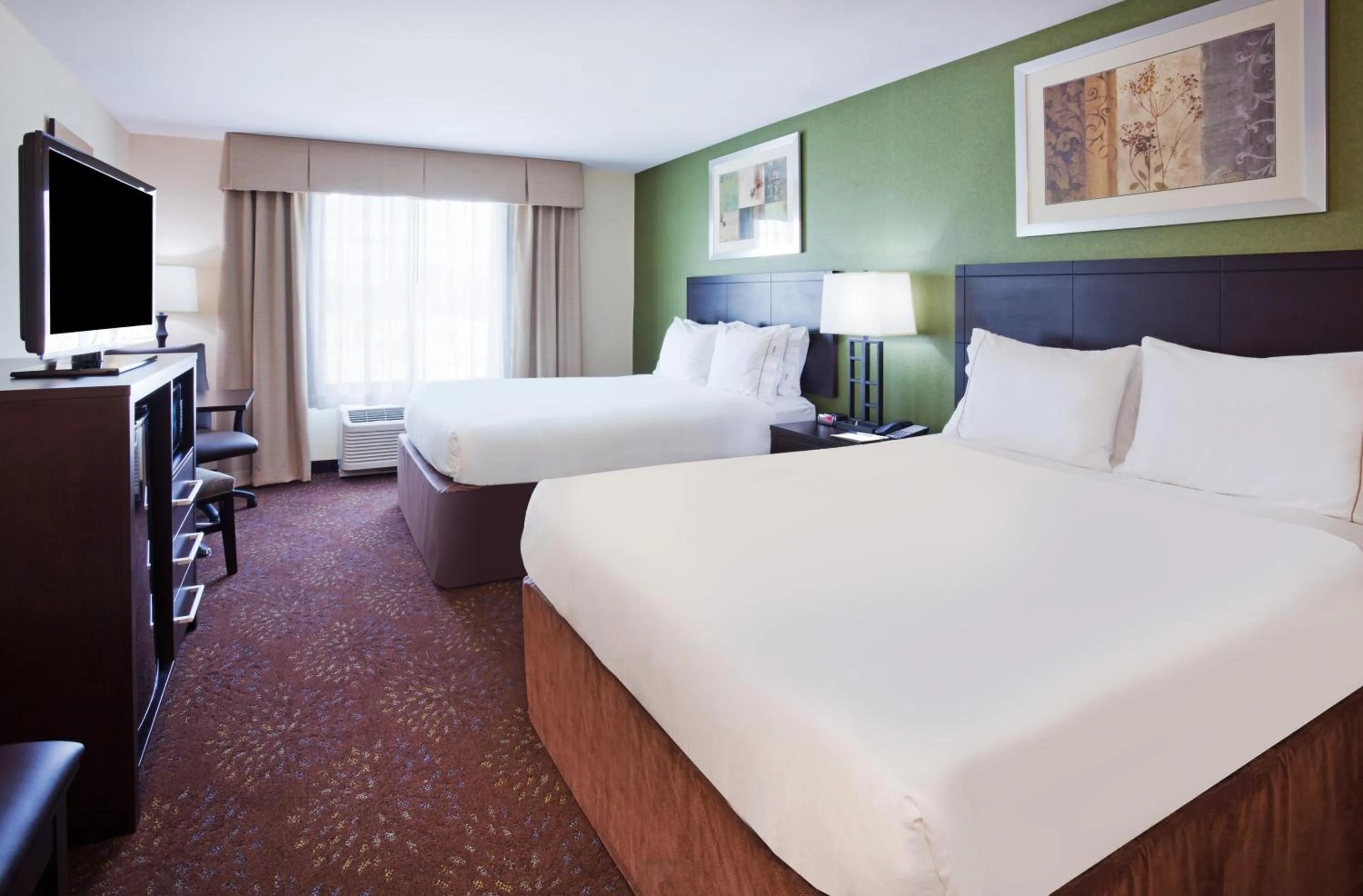 Bedroom, Bed in Holiday Inn Express and Suites Rochester West-Medical Center by IHG