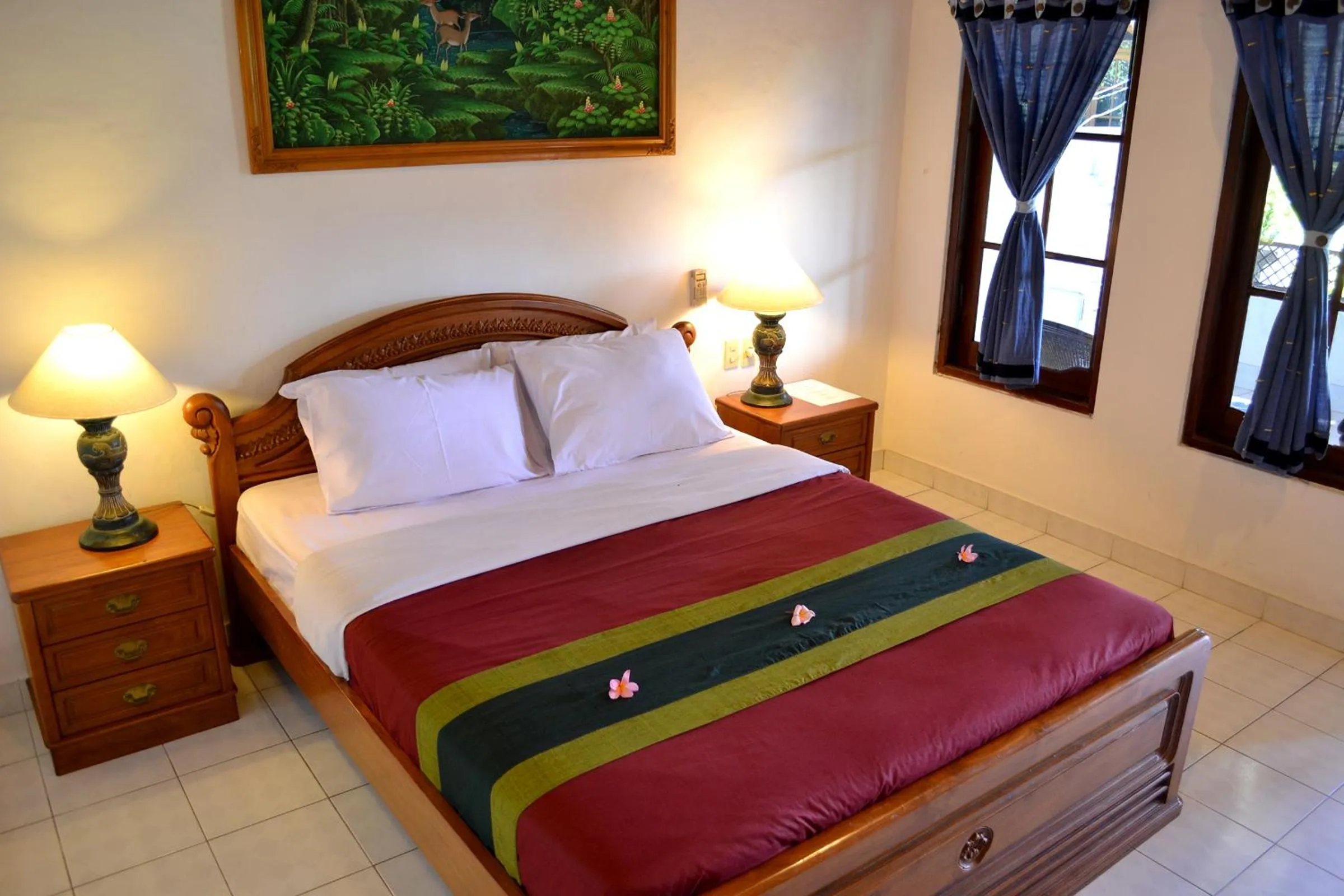 Bed in Flamboyan Hotel