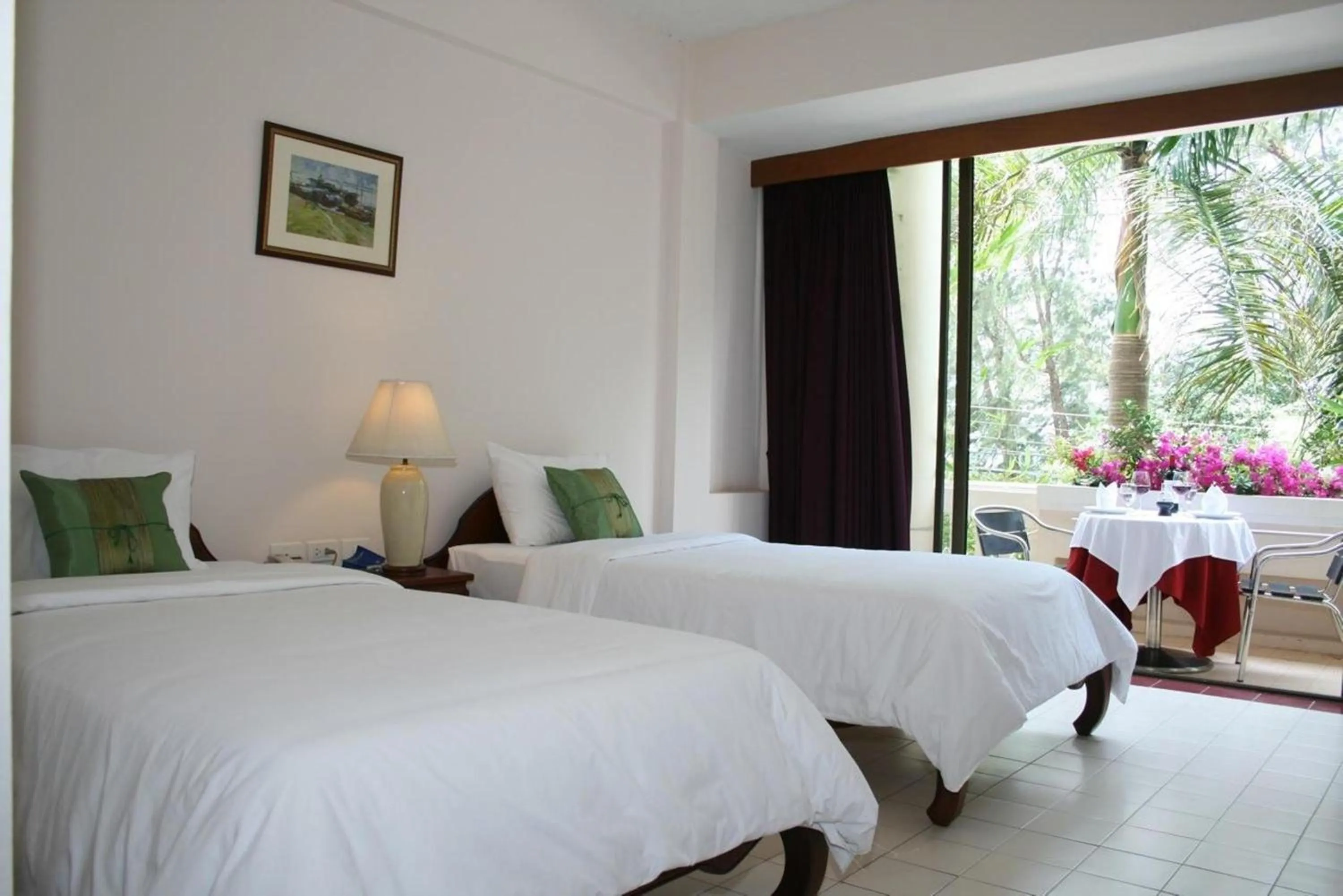 Bed in Mae Pim Resort Hotel