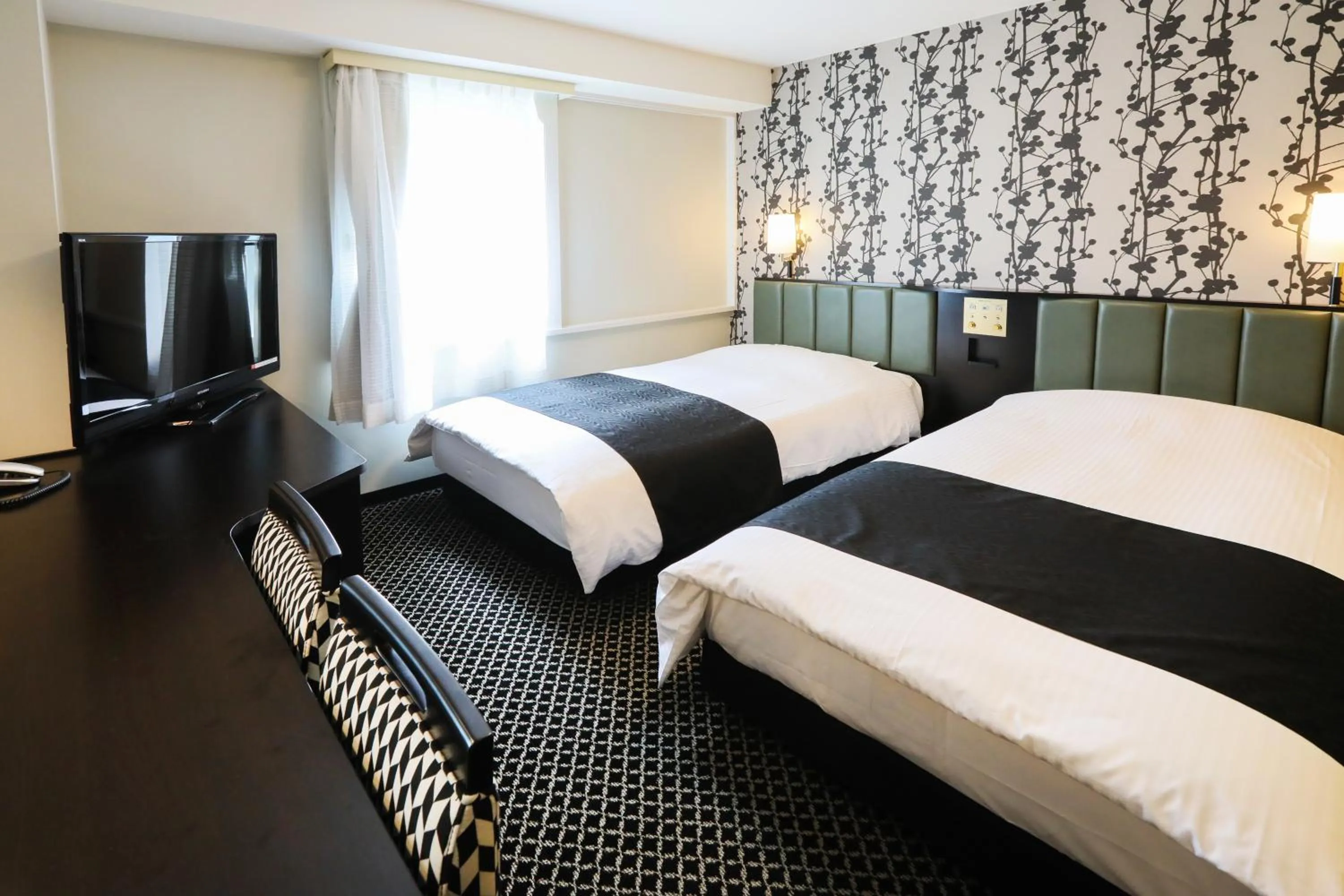 Photo of the whole room, Bed in APA Hotel Sapporo Susukino Ekimae