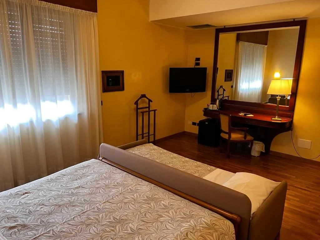 Bed in Grand Hotel Excelsior