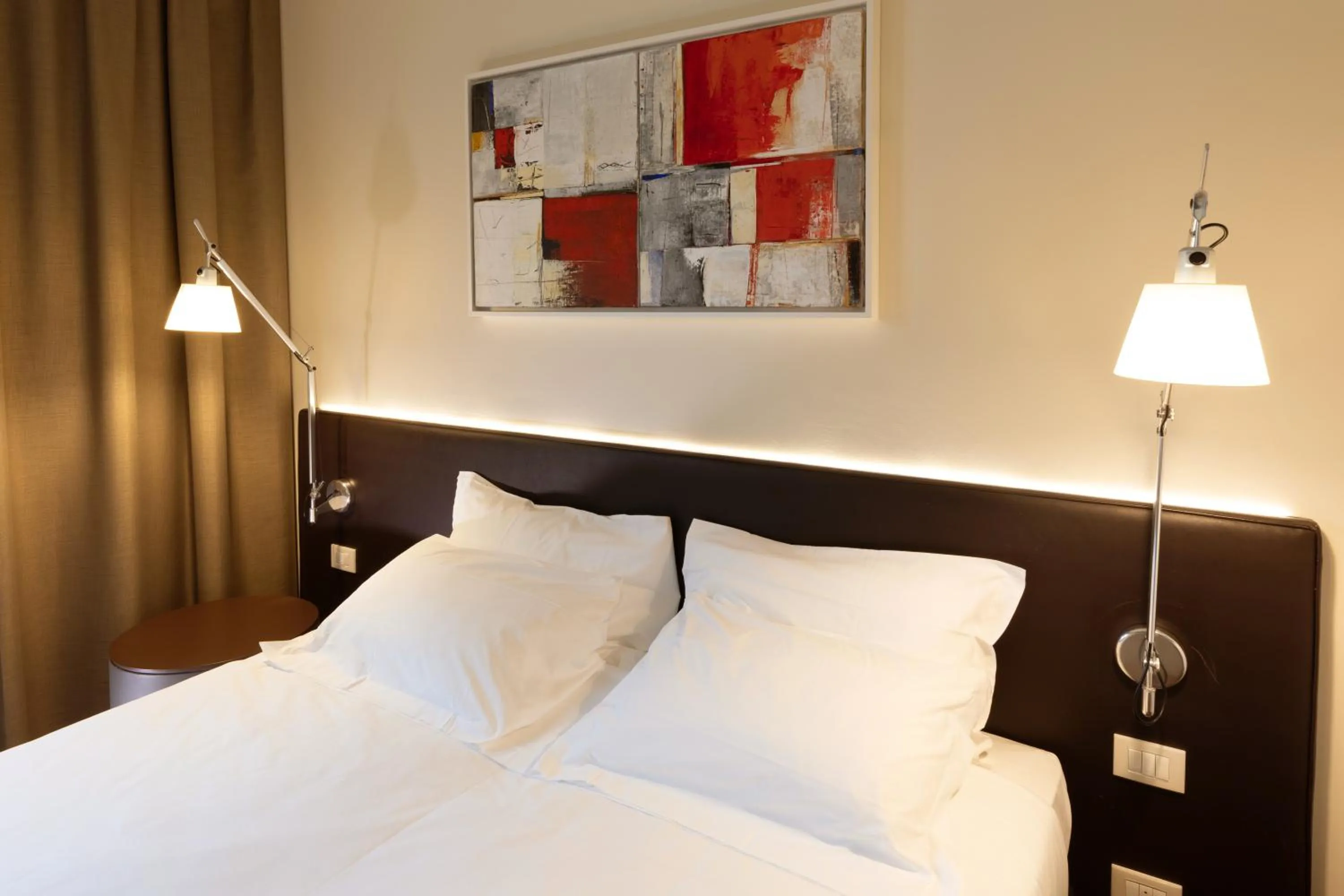 Bed in Boiardo Hotel