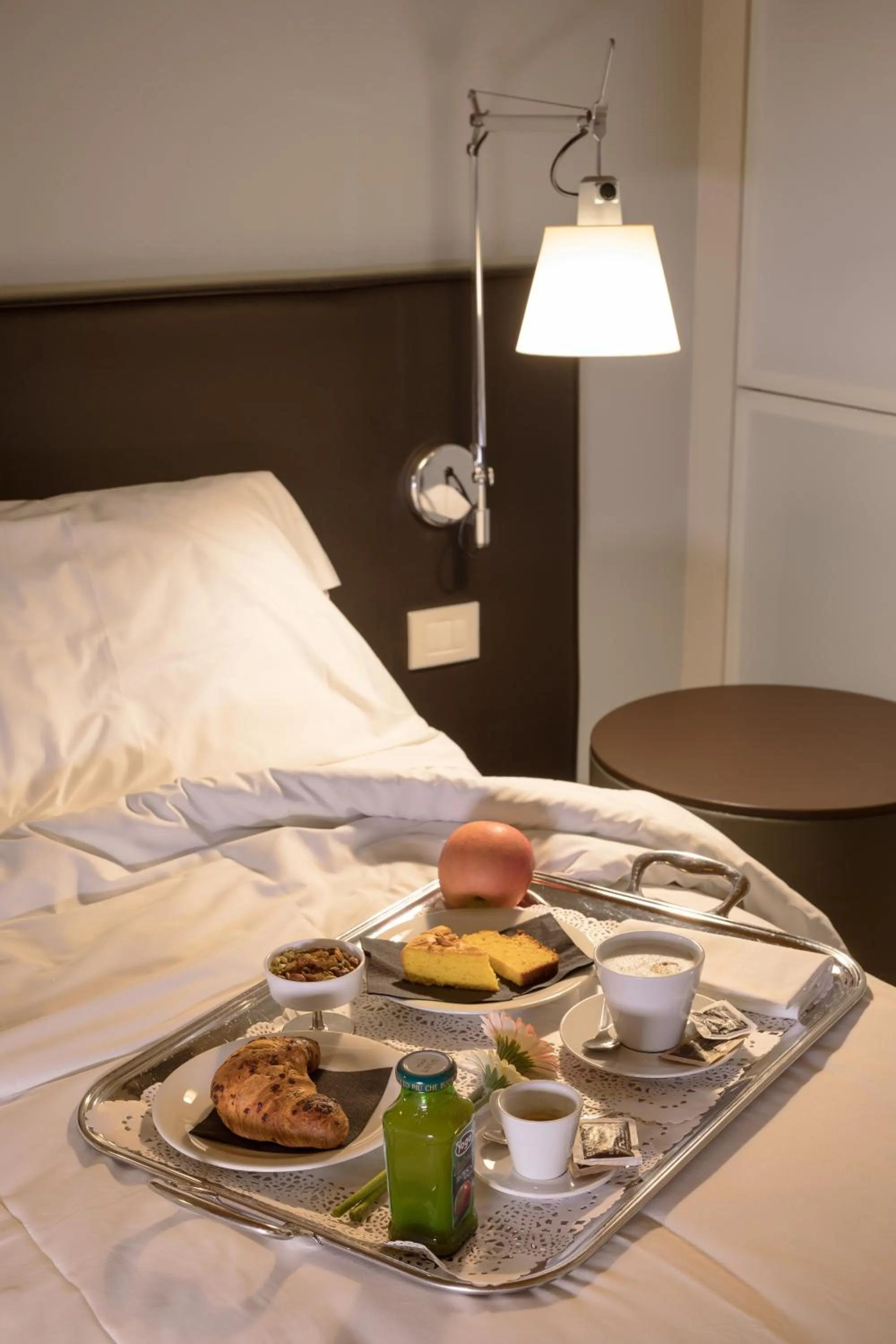 Bed in Boiardo Hotel