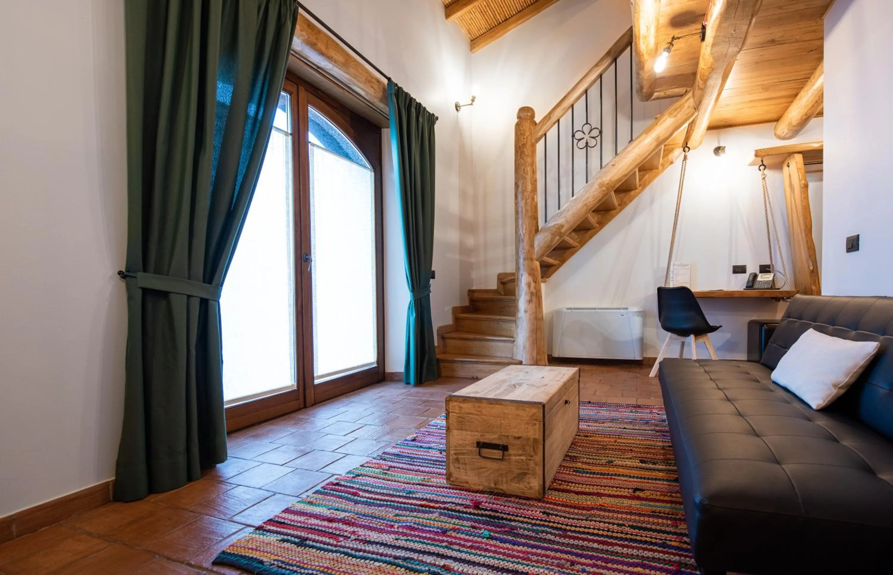 Living room in Etna Quota Mille Boutique Hotel, Typical Sicilian Food & Wine