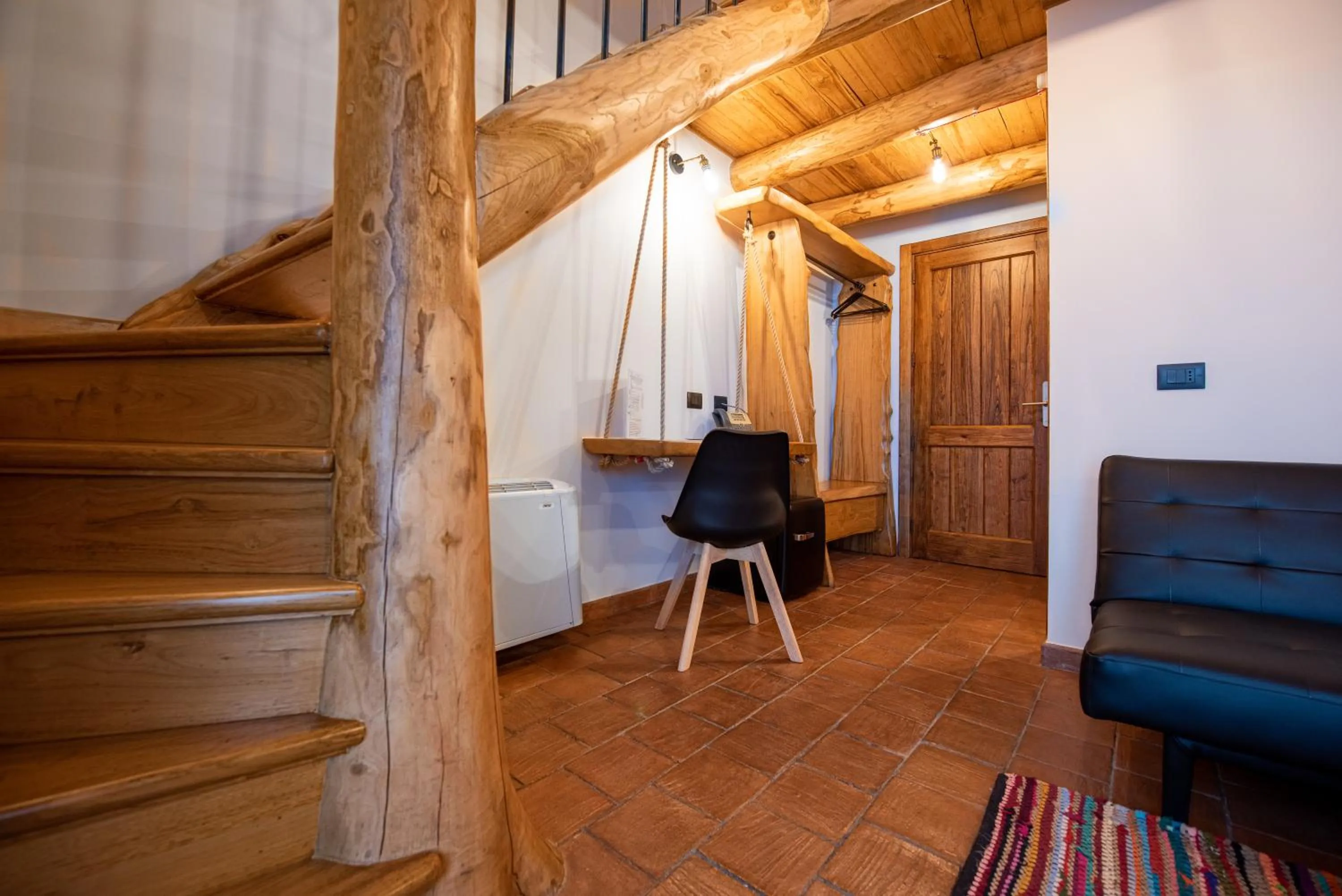 Living room in Etna Quota Mille Boutique Hotel, Typical Sicilian Food & Wine