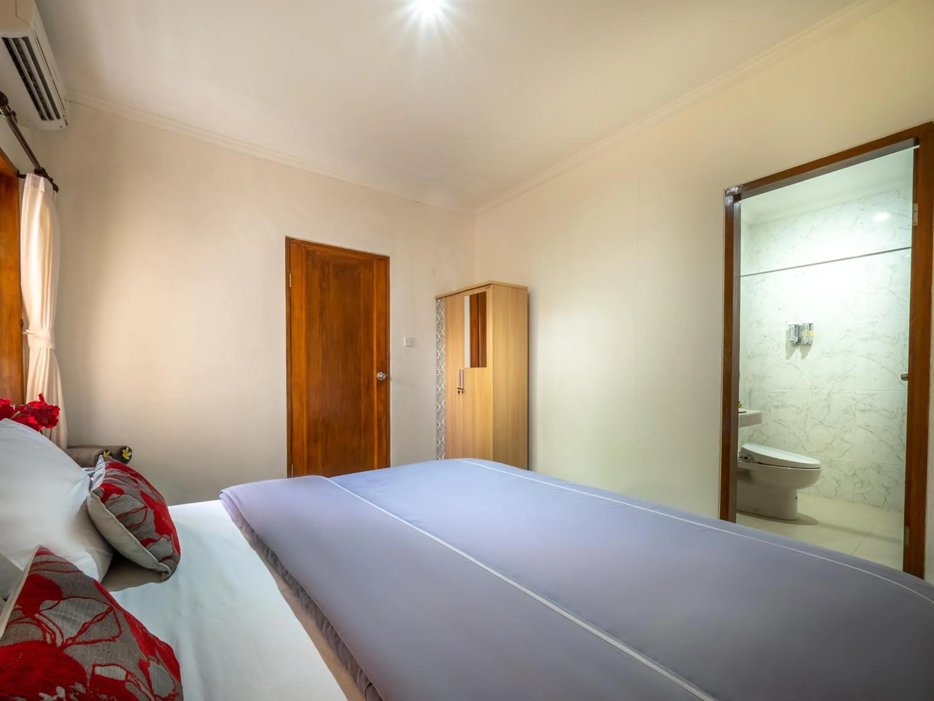 Bed in Tiis Garden Puri Villas