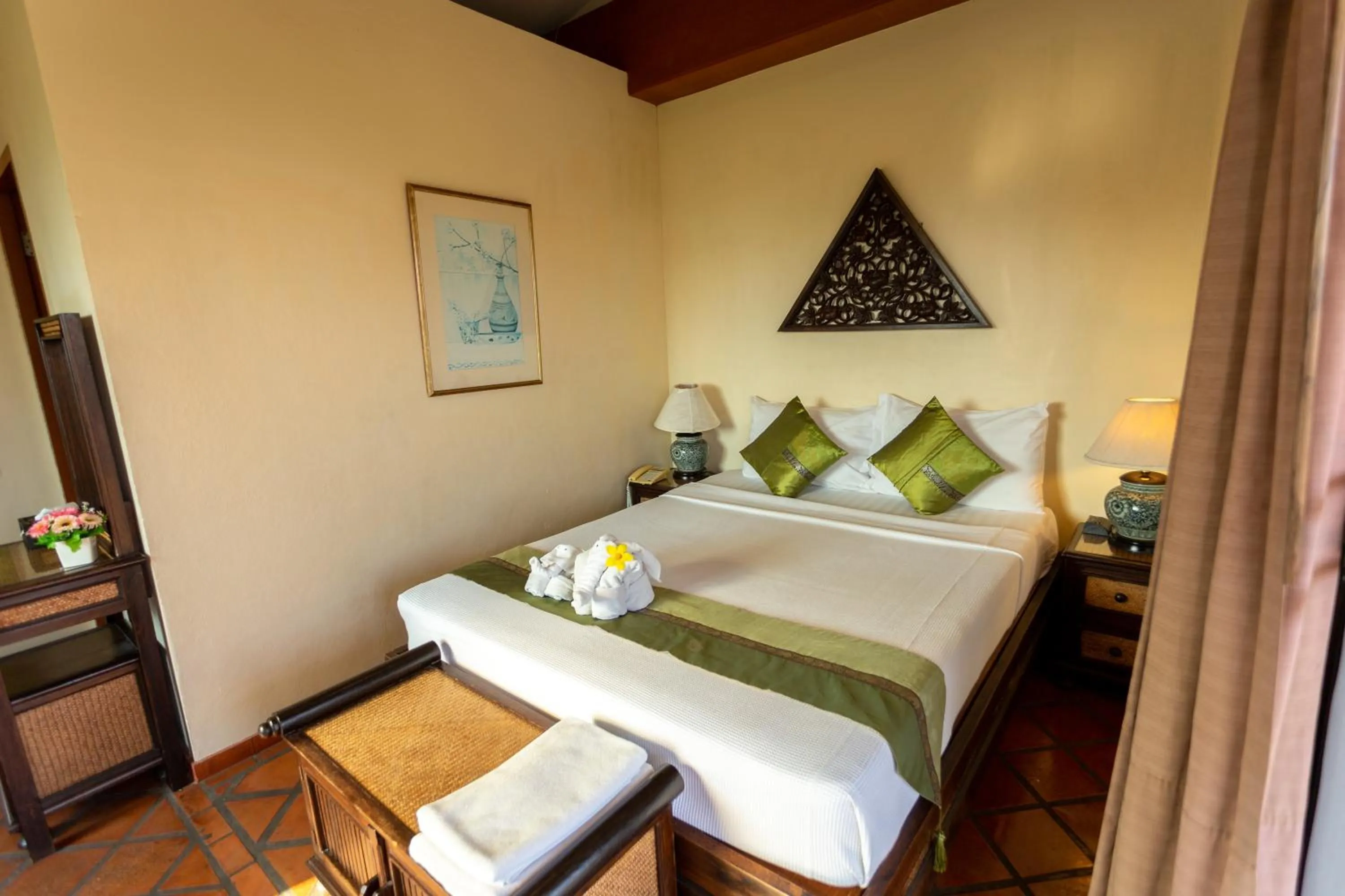 Bed in Chang Charlie Inn, Boutique