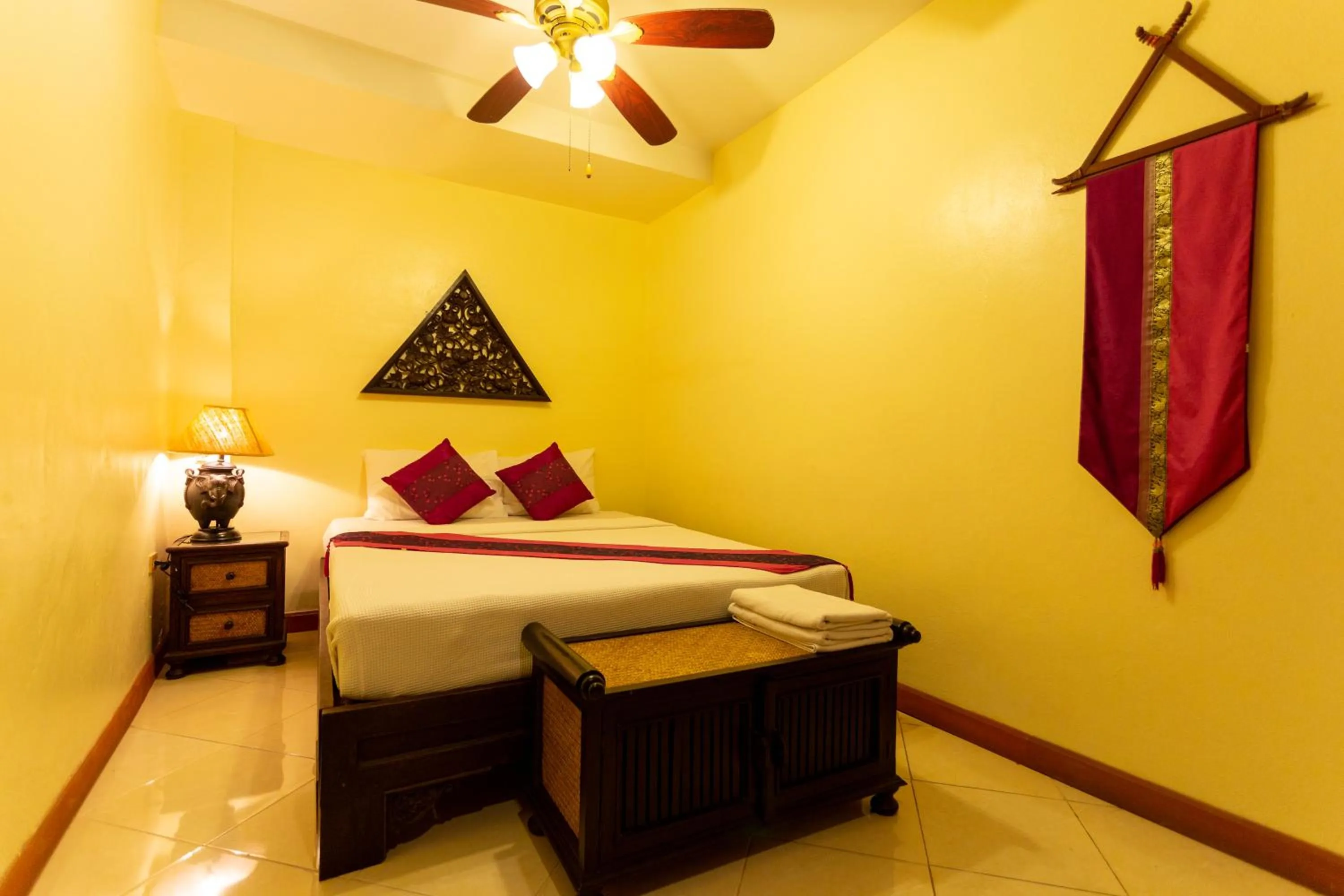 Bed in Chang Charlie Inn, Boutique