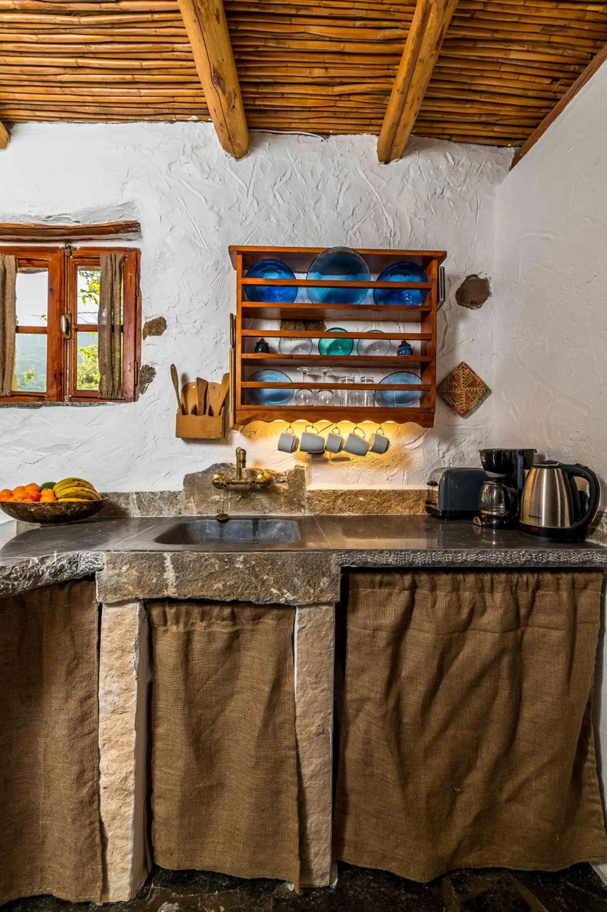 Kitchen or kitchenette in Natura cottages