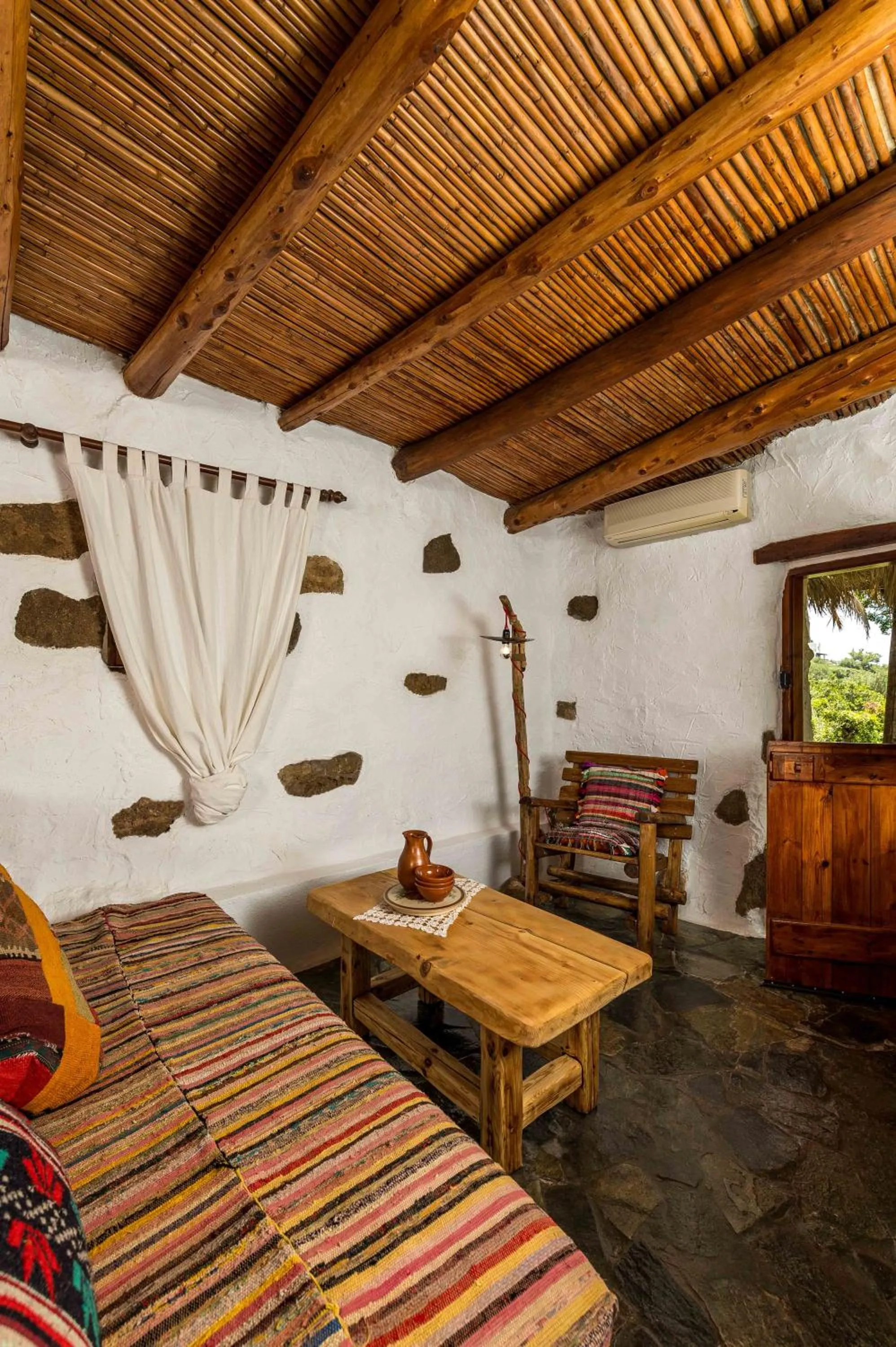 Living room, Bed in Natura cottages