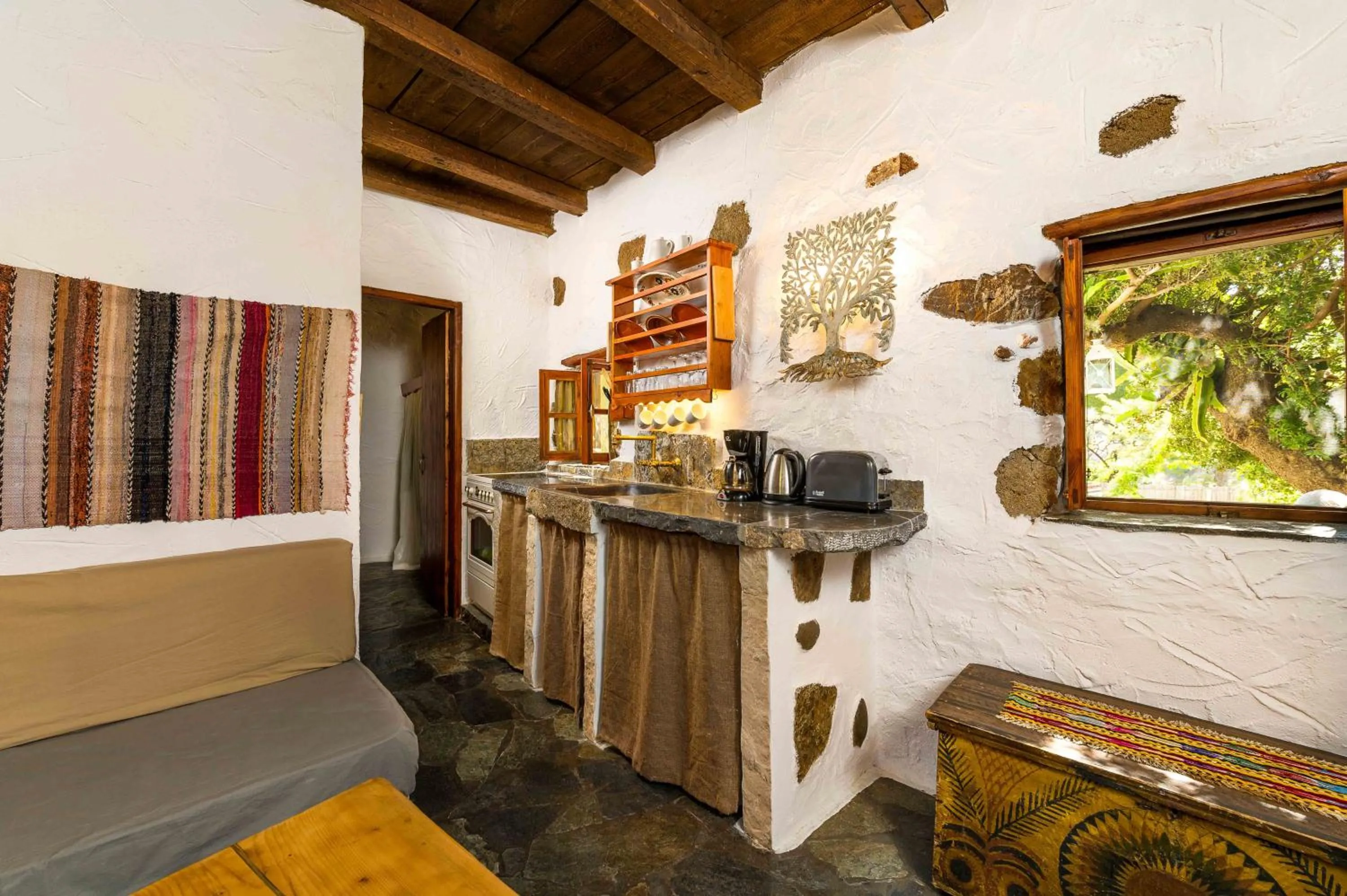 Kitchen or kitchenette in Natura cottages