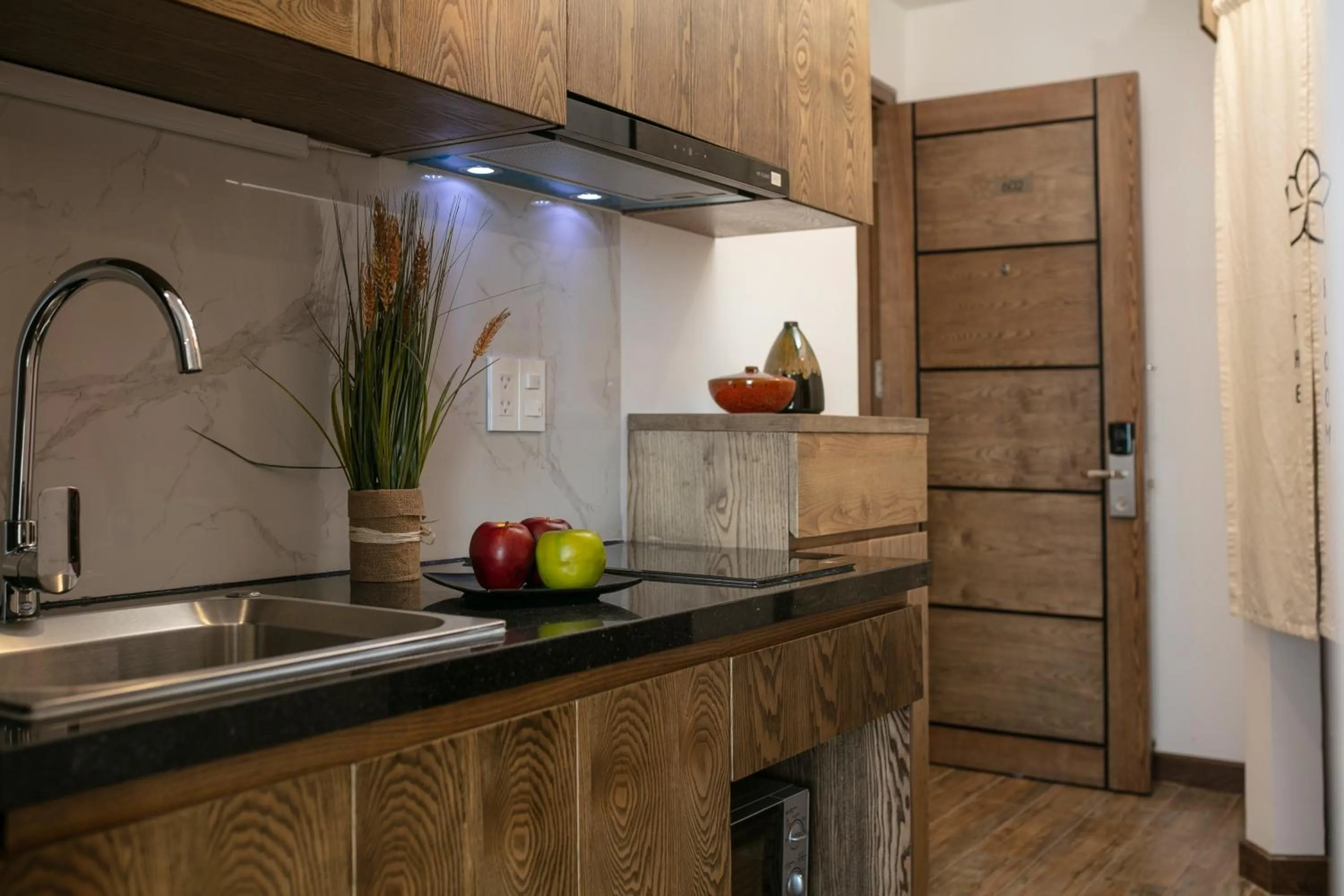 Kitchen or kitchenette in The Bloom Pham Viet Chanh - Modern Living Space in Saigon - A Top Choice for Western Travelers