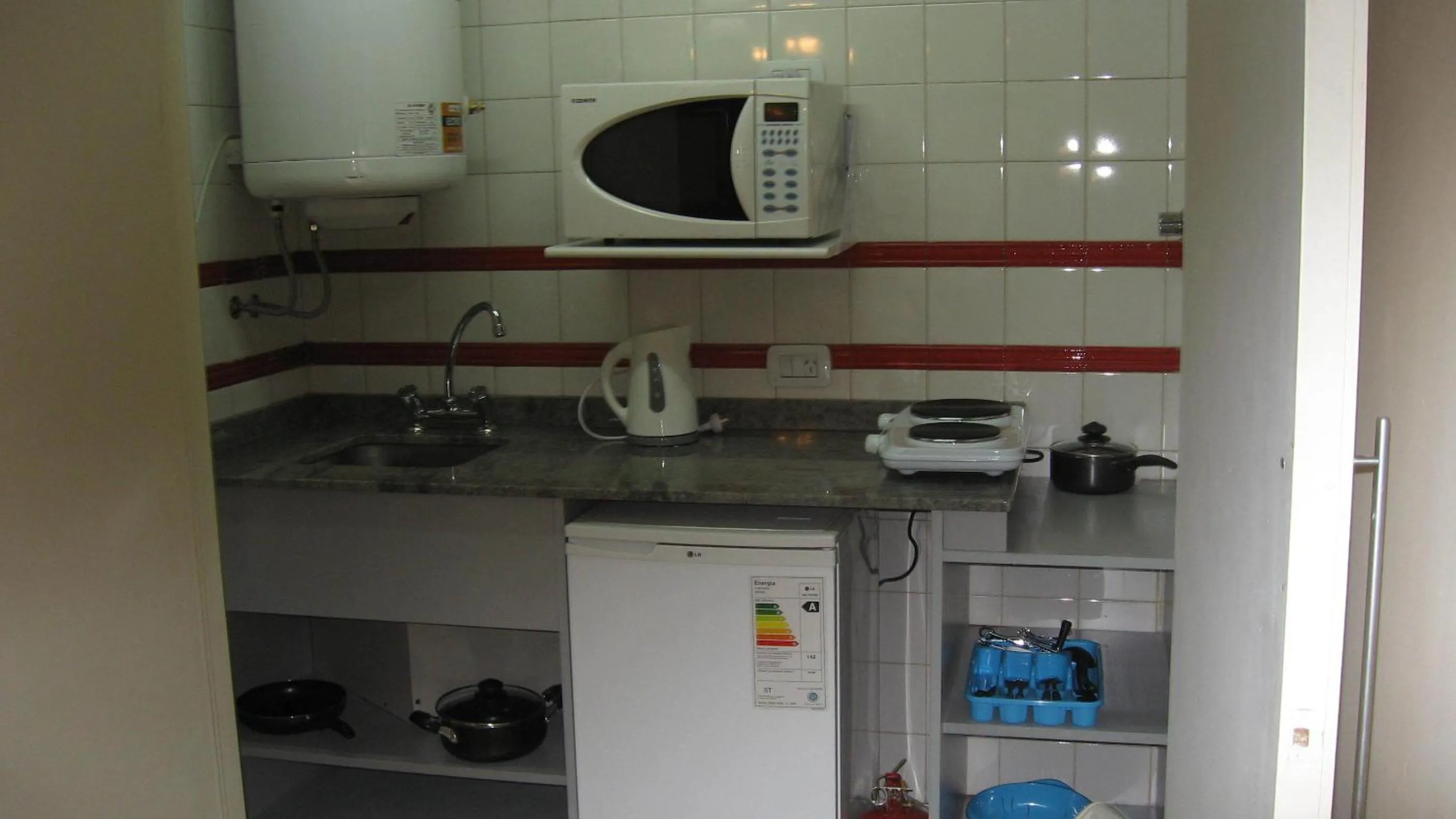 Kitchen or kitchenette in Córdoba Suites Recoleta