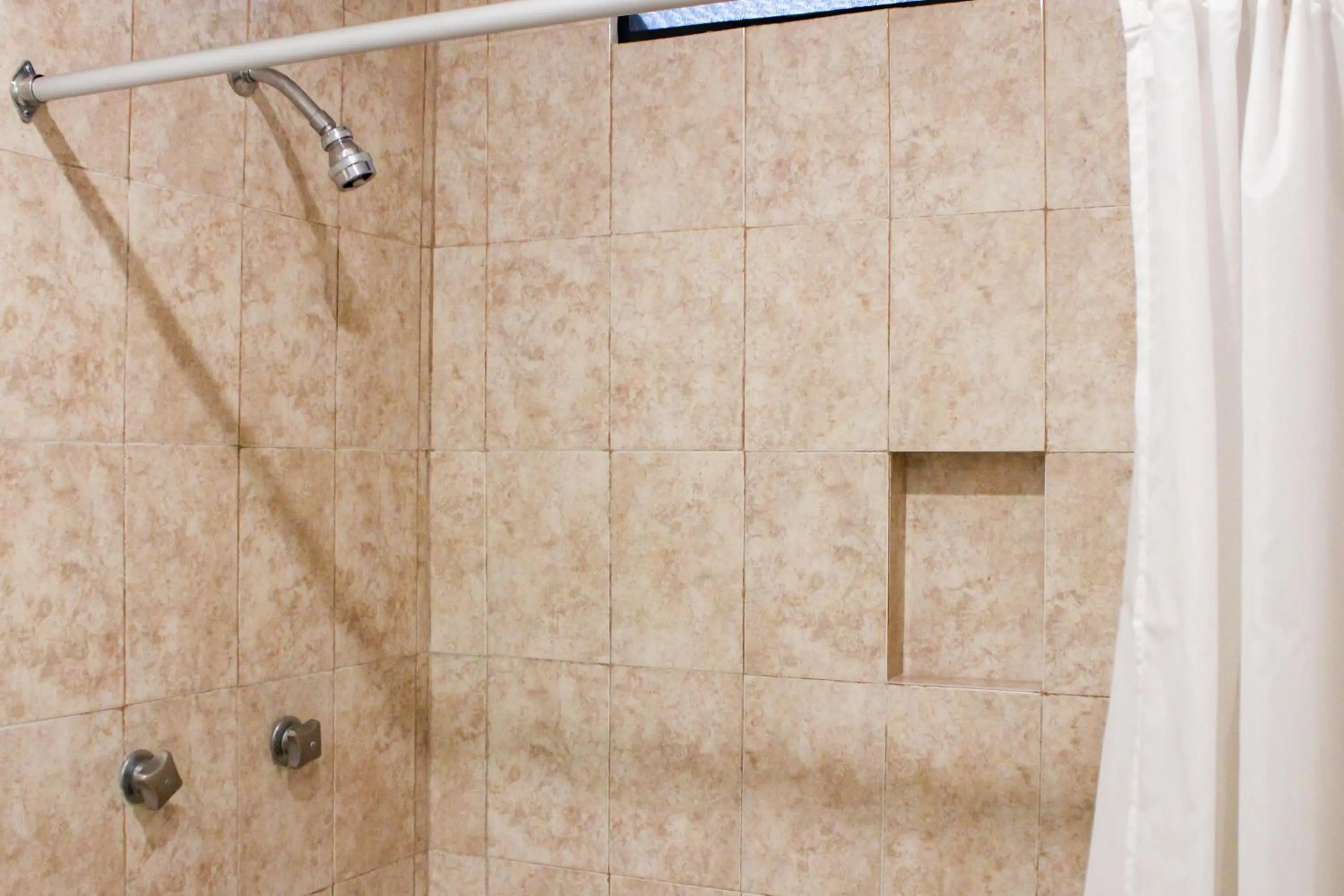 Shower in Hotel & Suites Real del Lago