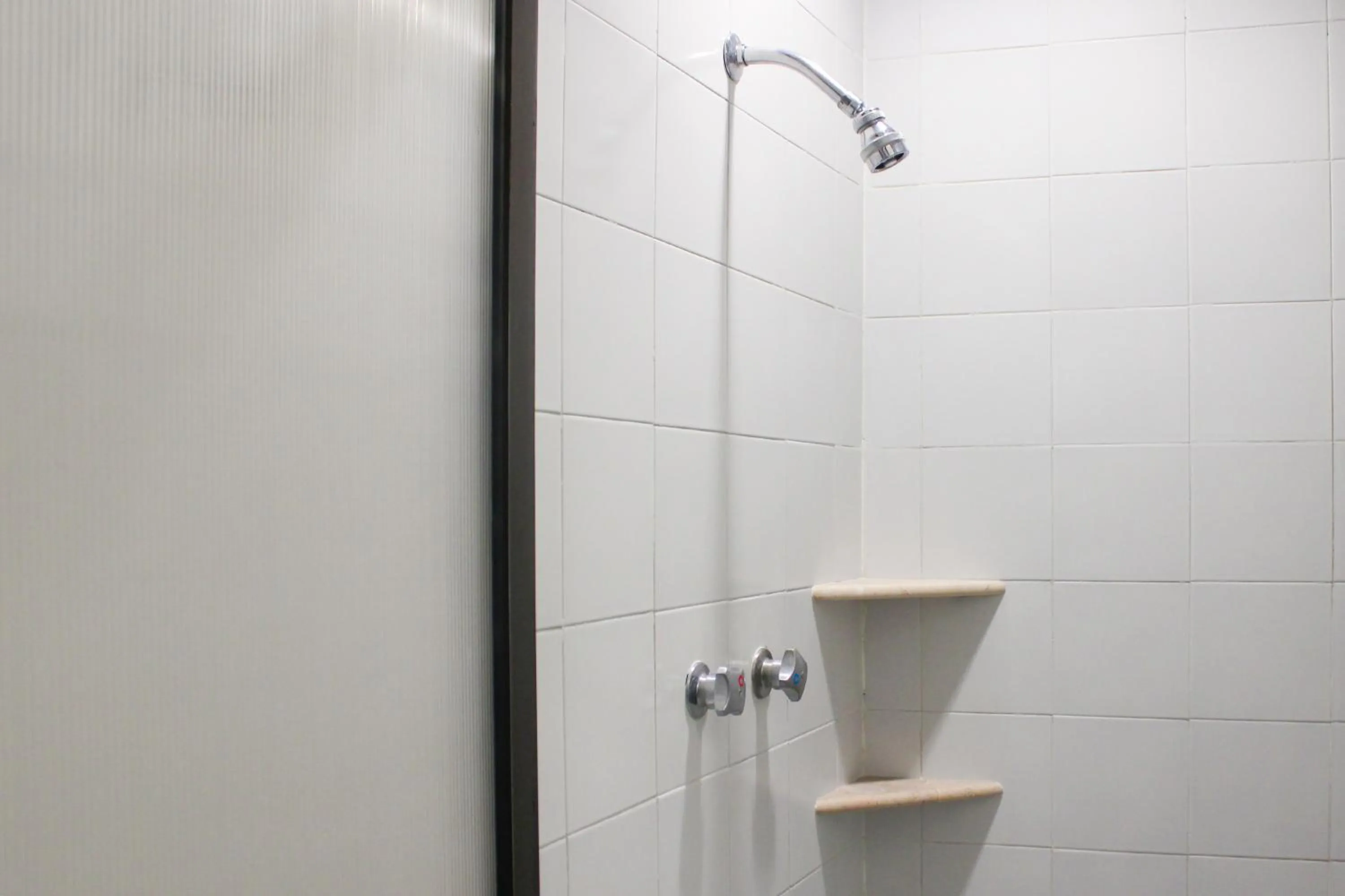 Shower in Hotel & Suites Real del Lago