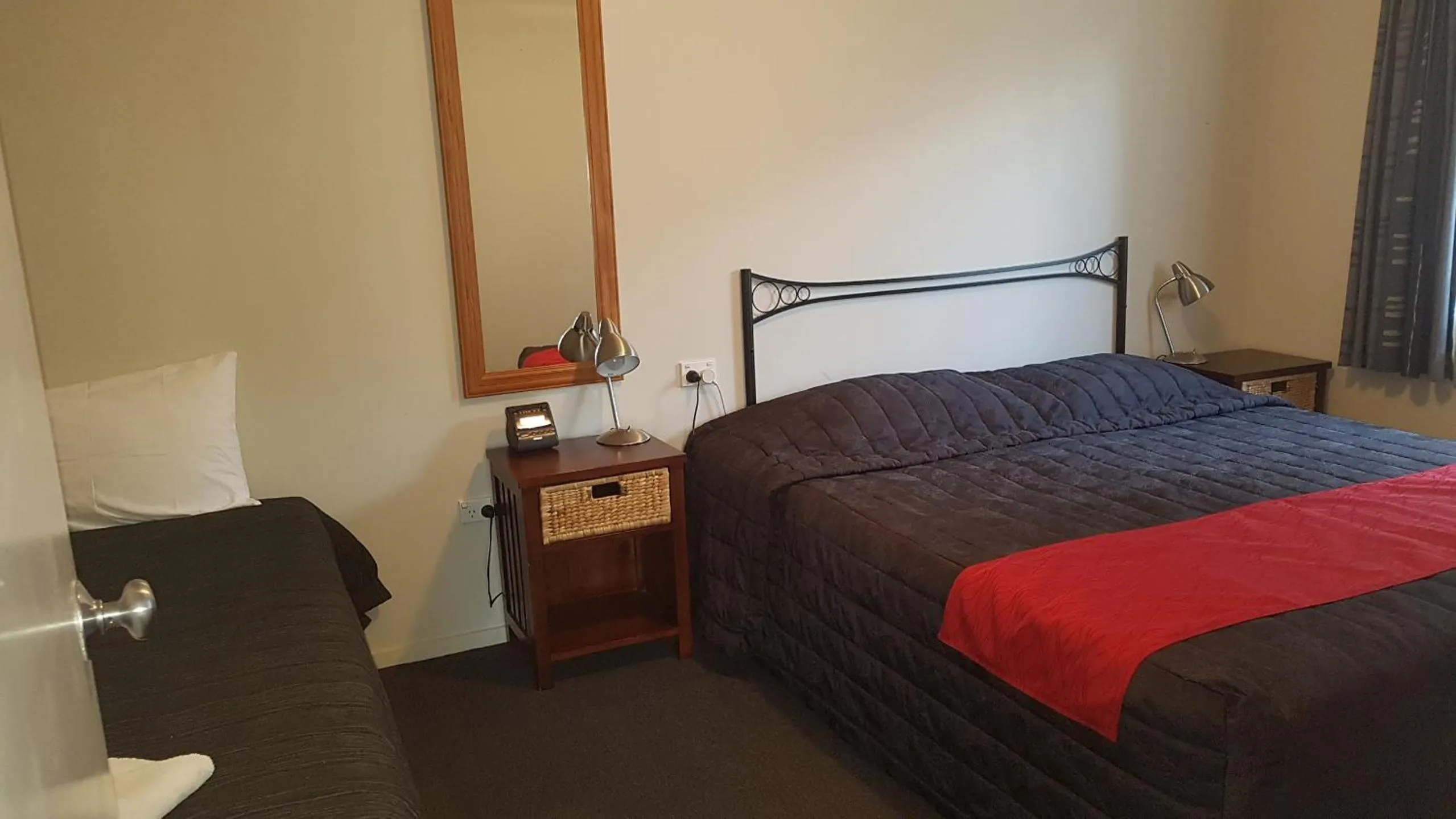 Bed in Palm Court Motel