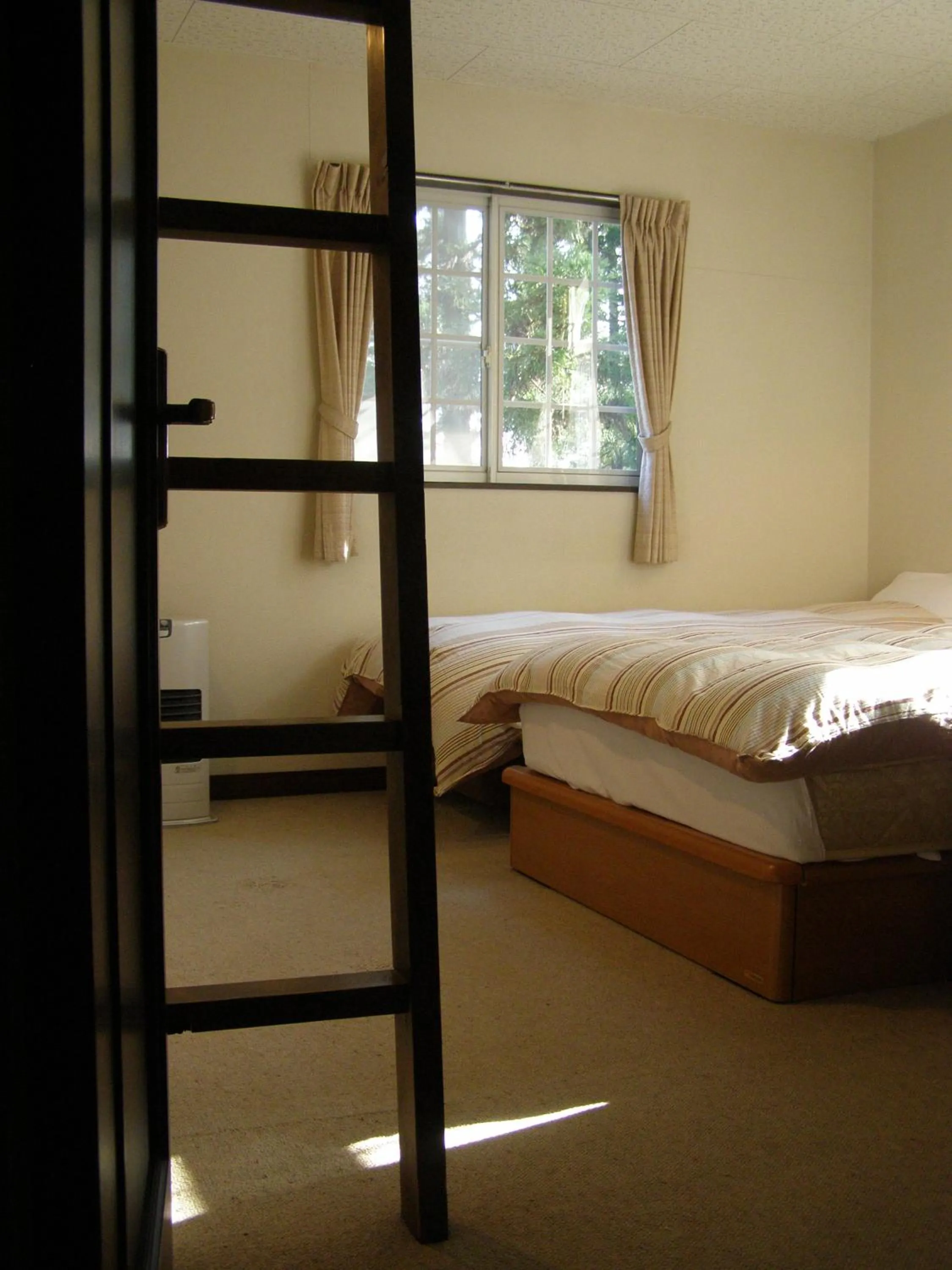 Bed in Sunny Side Hut