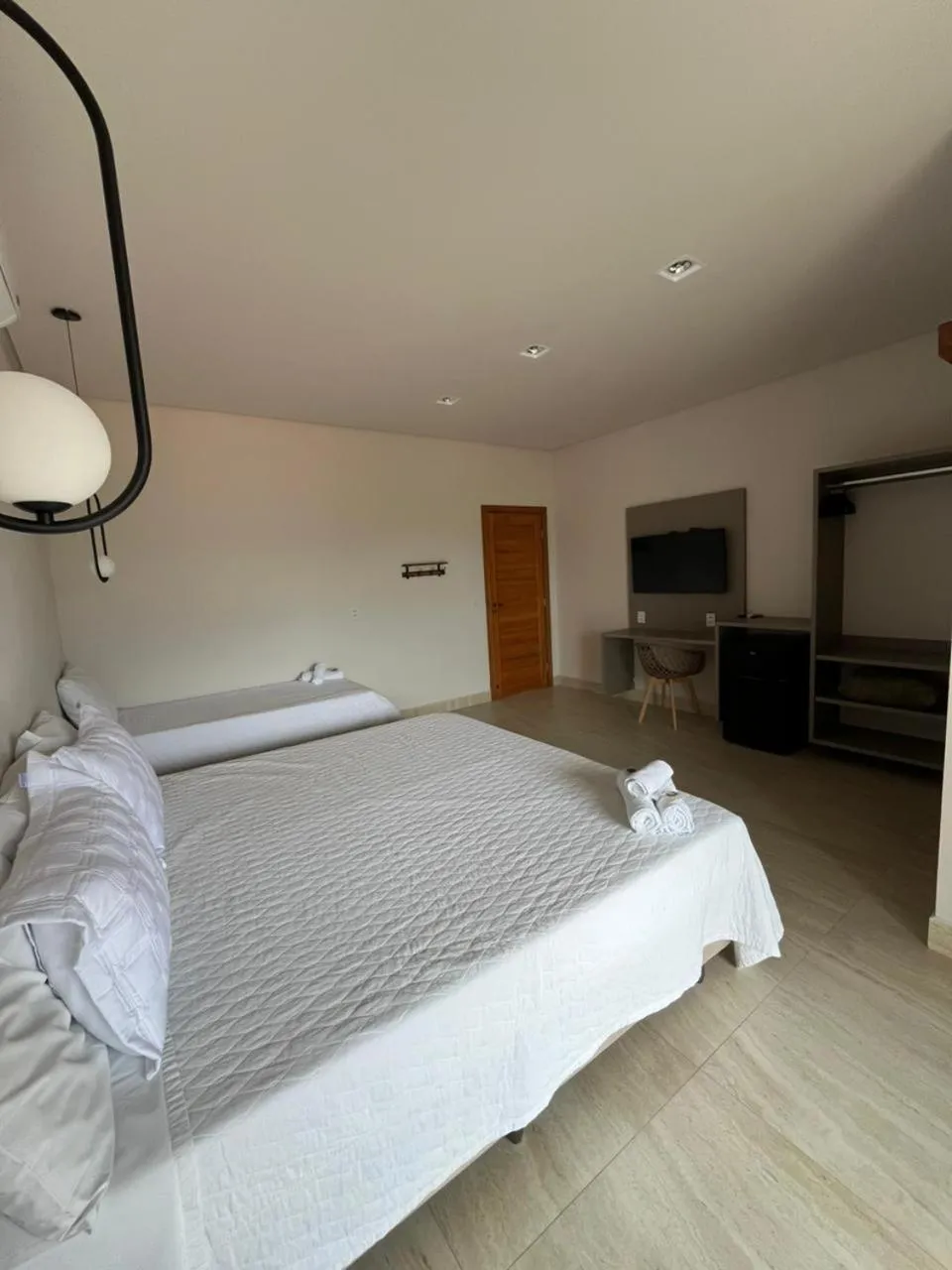 Bed in Pousada Quintal da Lua