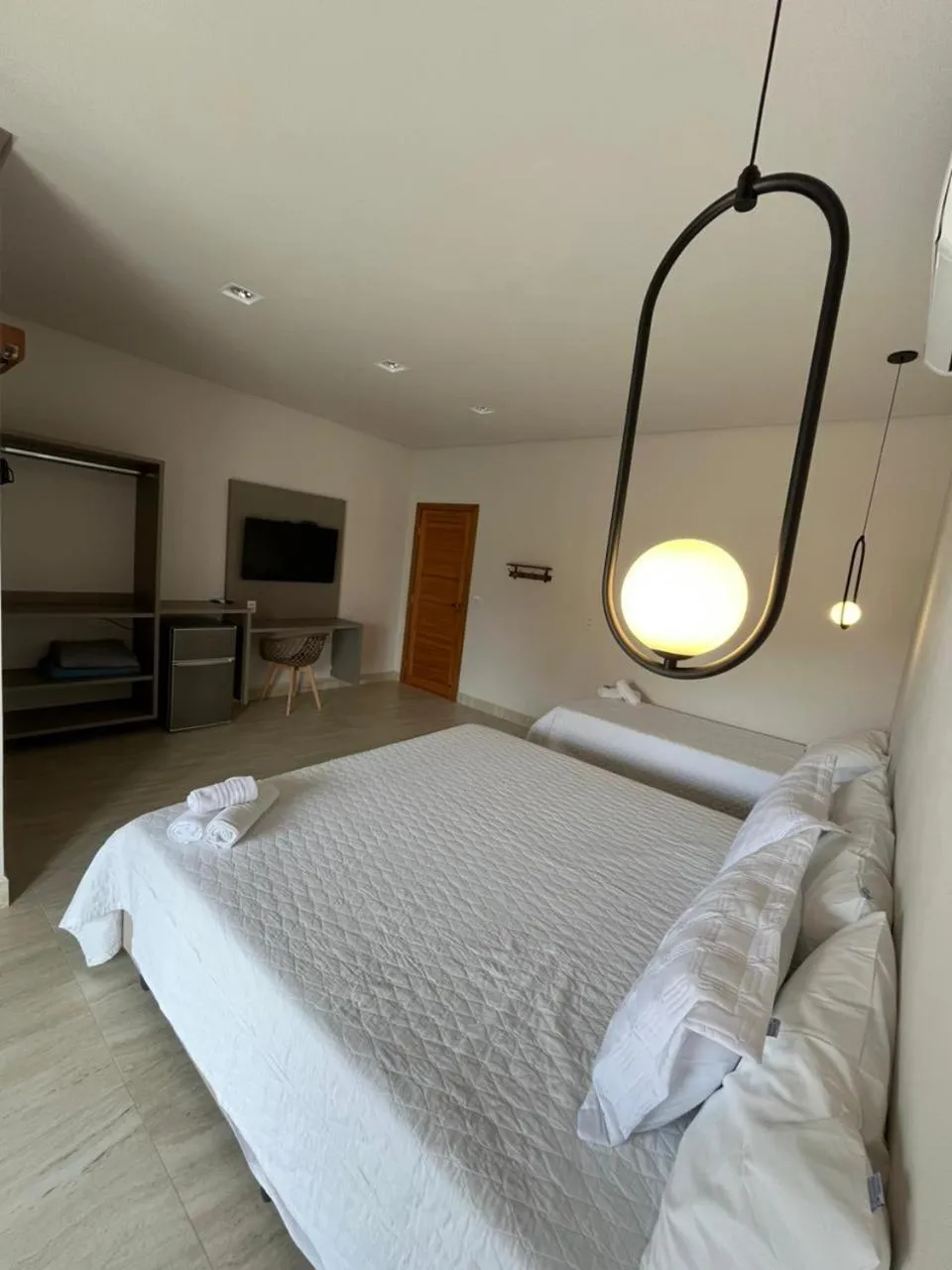 Bed in Pousada Quintal da Lua