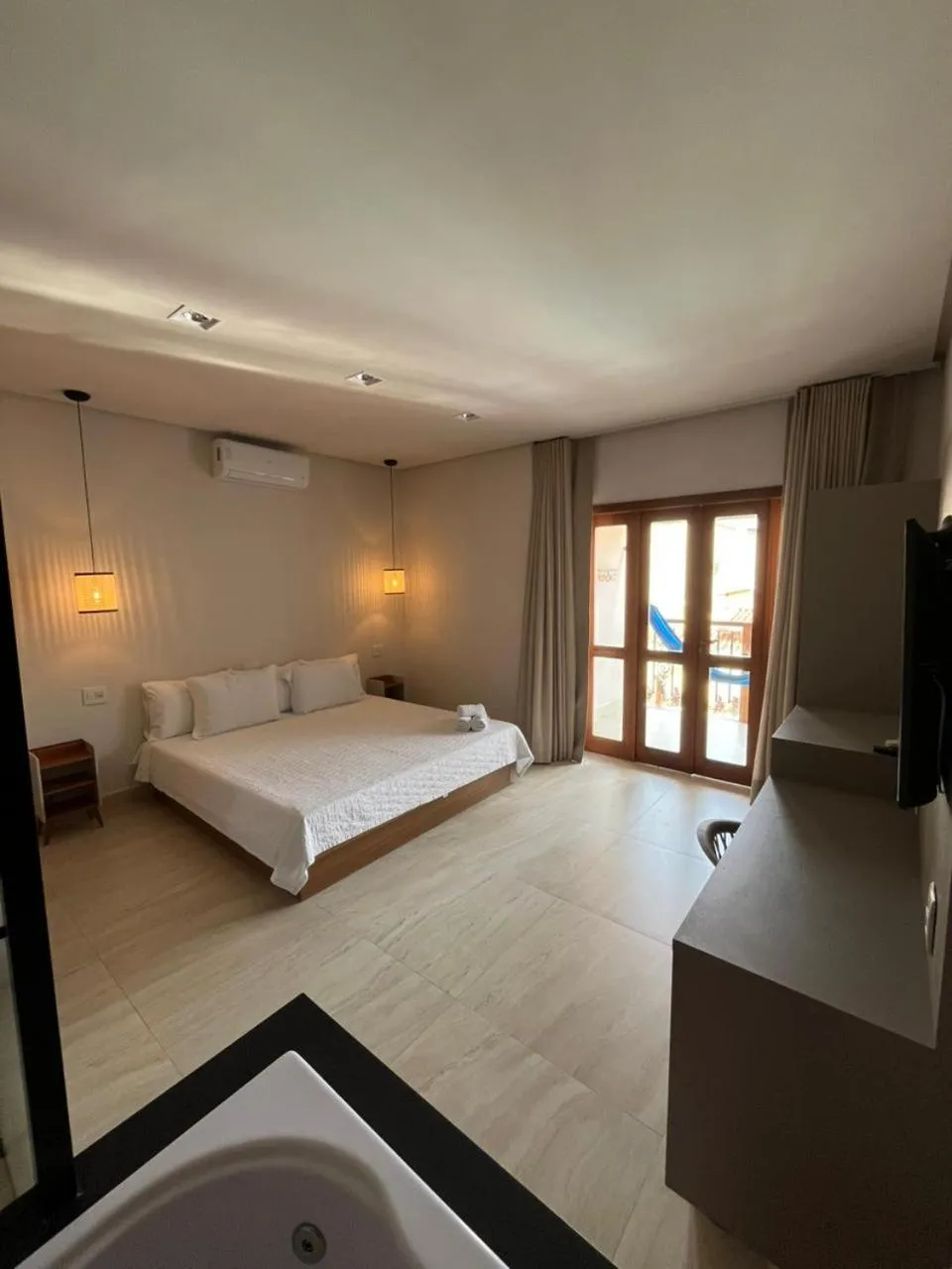 Bed in Pousada Quintal da Lua