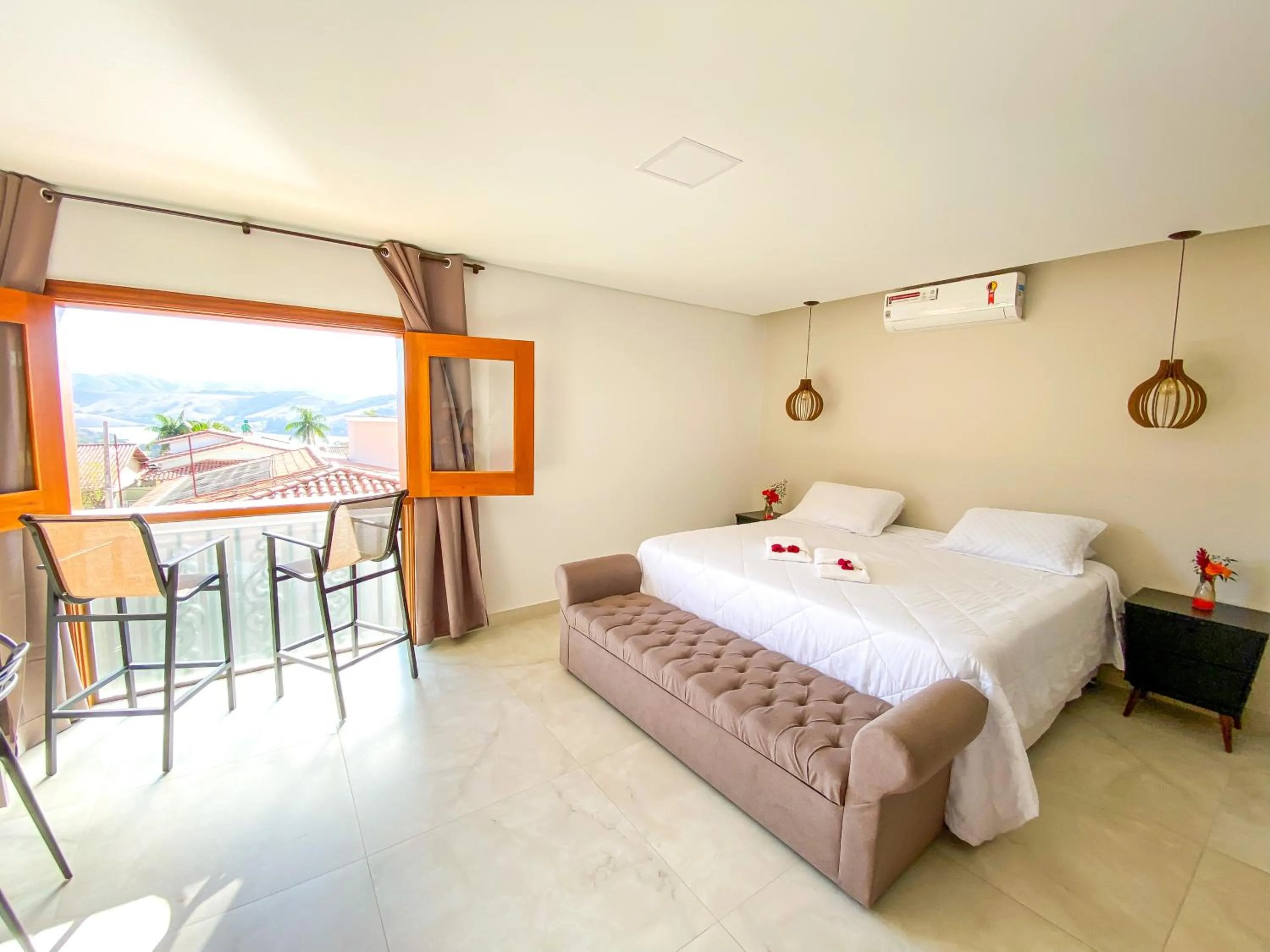 Photo of the whole room, Bed in Pousada Quintal da Lua