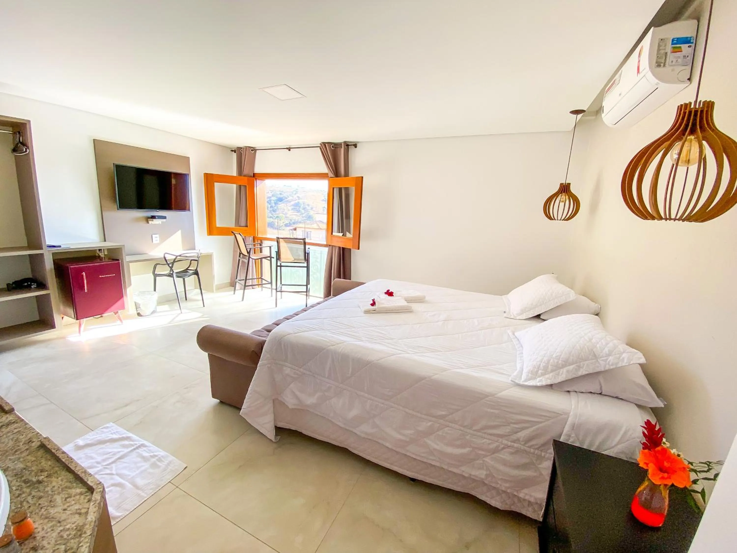 Photo of the whole room, Bed in Pousada Quintal da Lua
