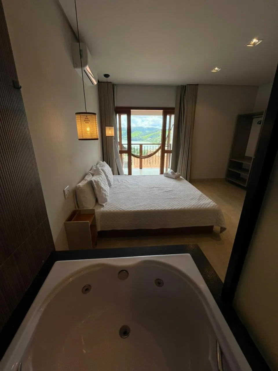 Bed in Pousada Quintal da Lua