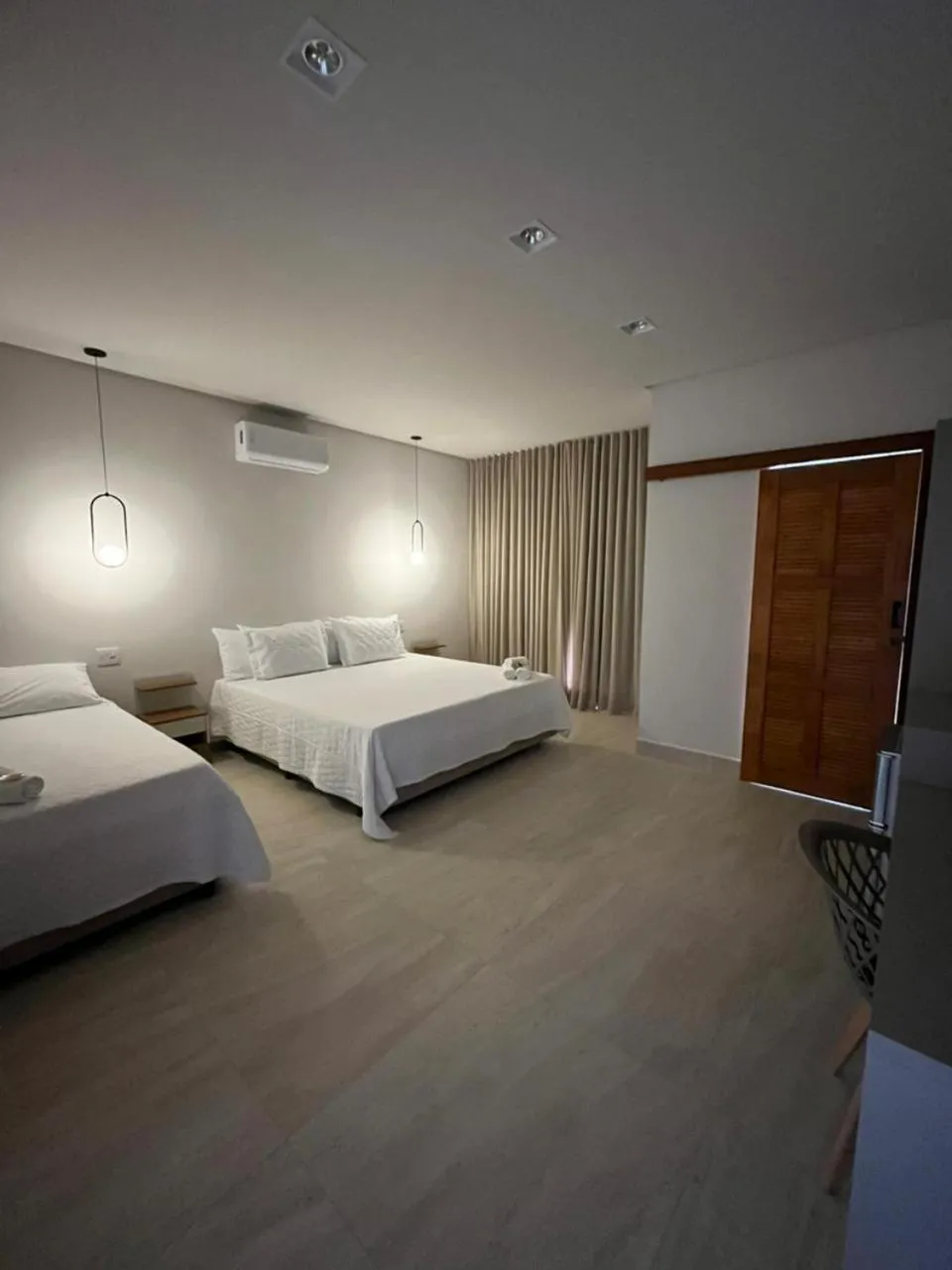 Bed in Pousada Quintal da Lua