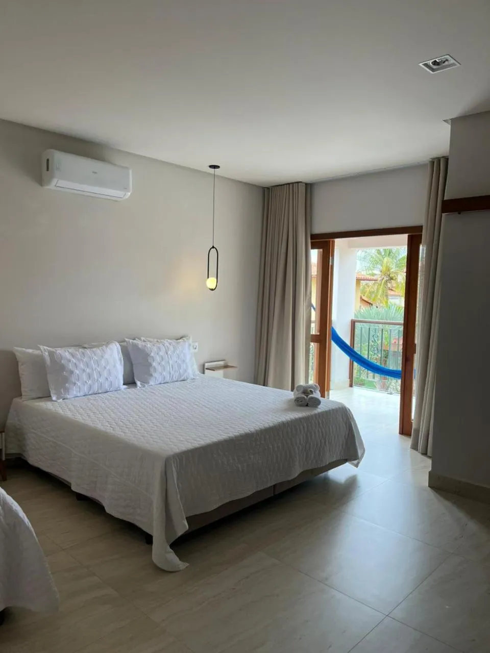 Bed in Pousada Quintal da Lua