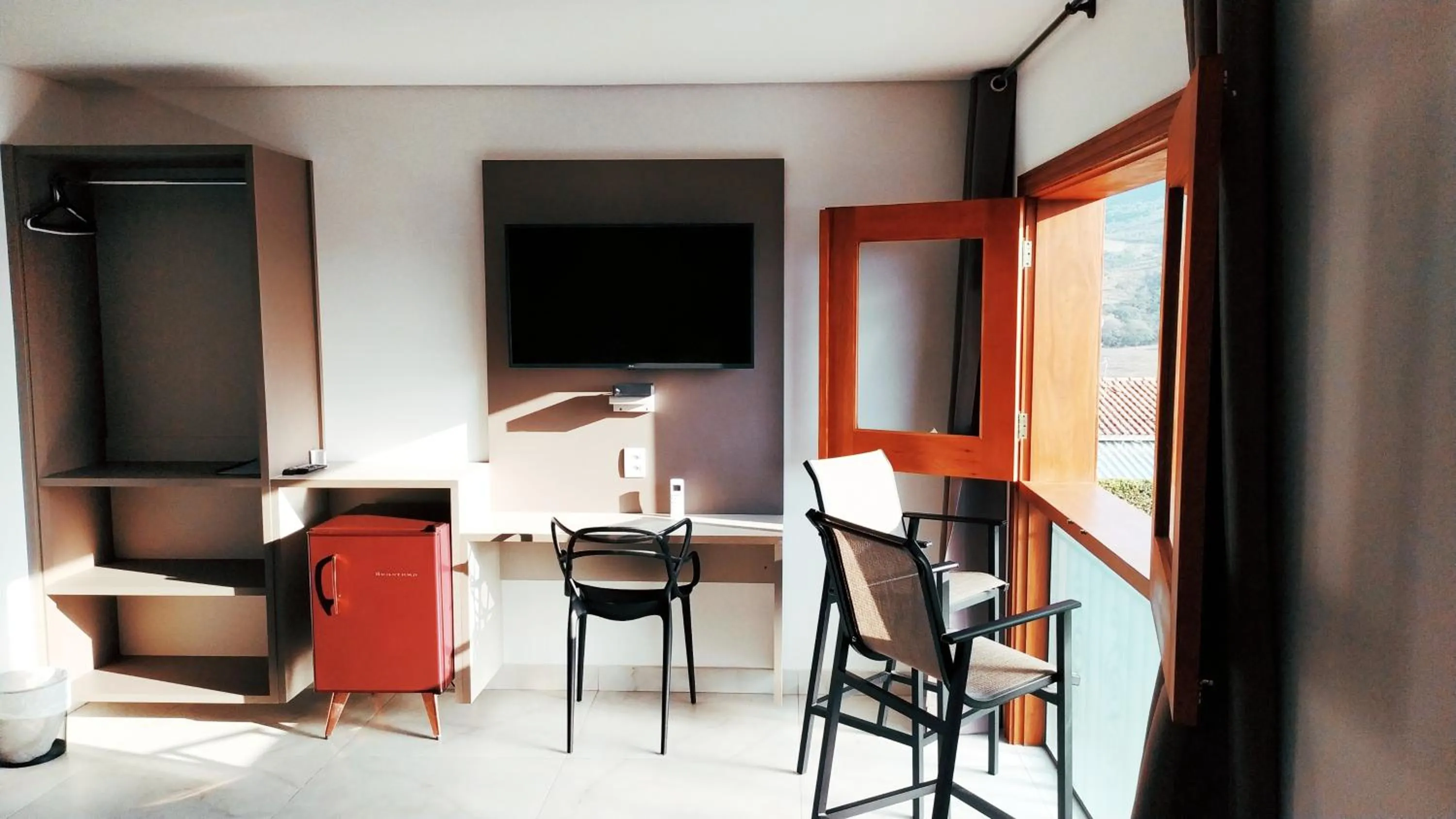 TV and multimedia in Pousada Quintal da Lua