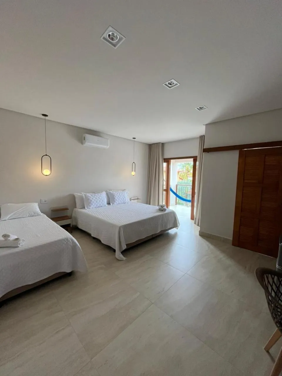 Bed in Pousada Quintal da Lua