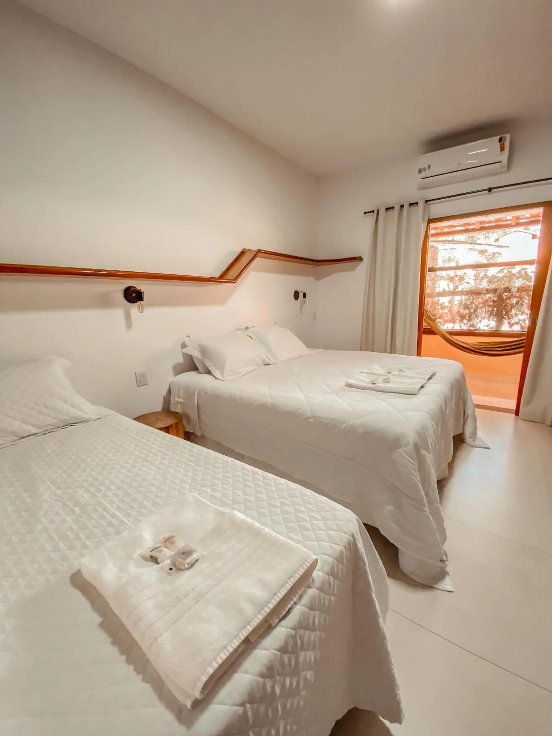 Photo of the whole room, Bed in Pousada Quintal da Lua