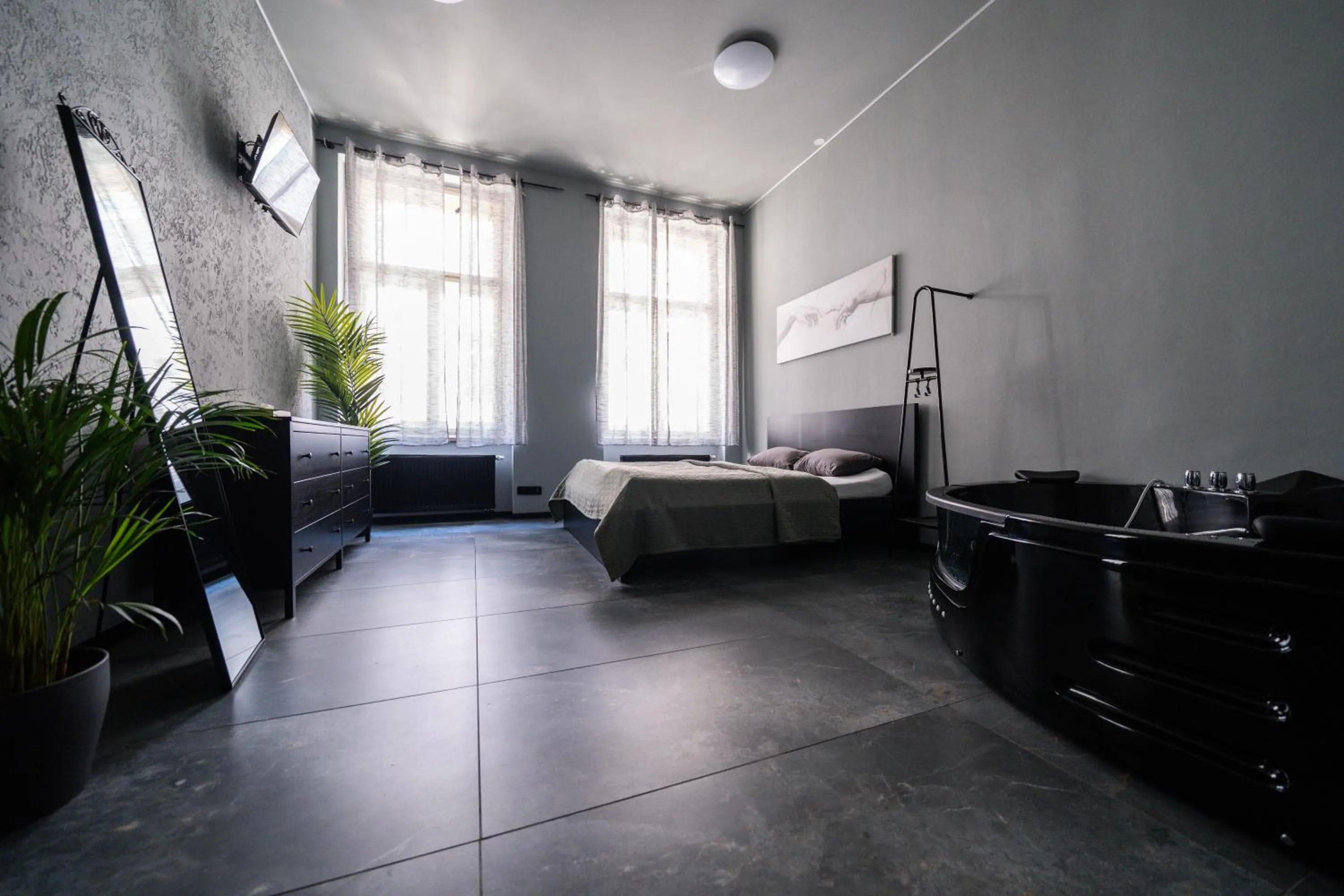 Photo of the whole room, Bed in Wellness Rooms Central